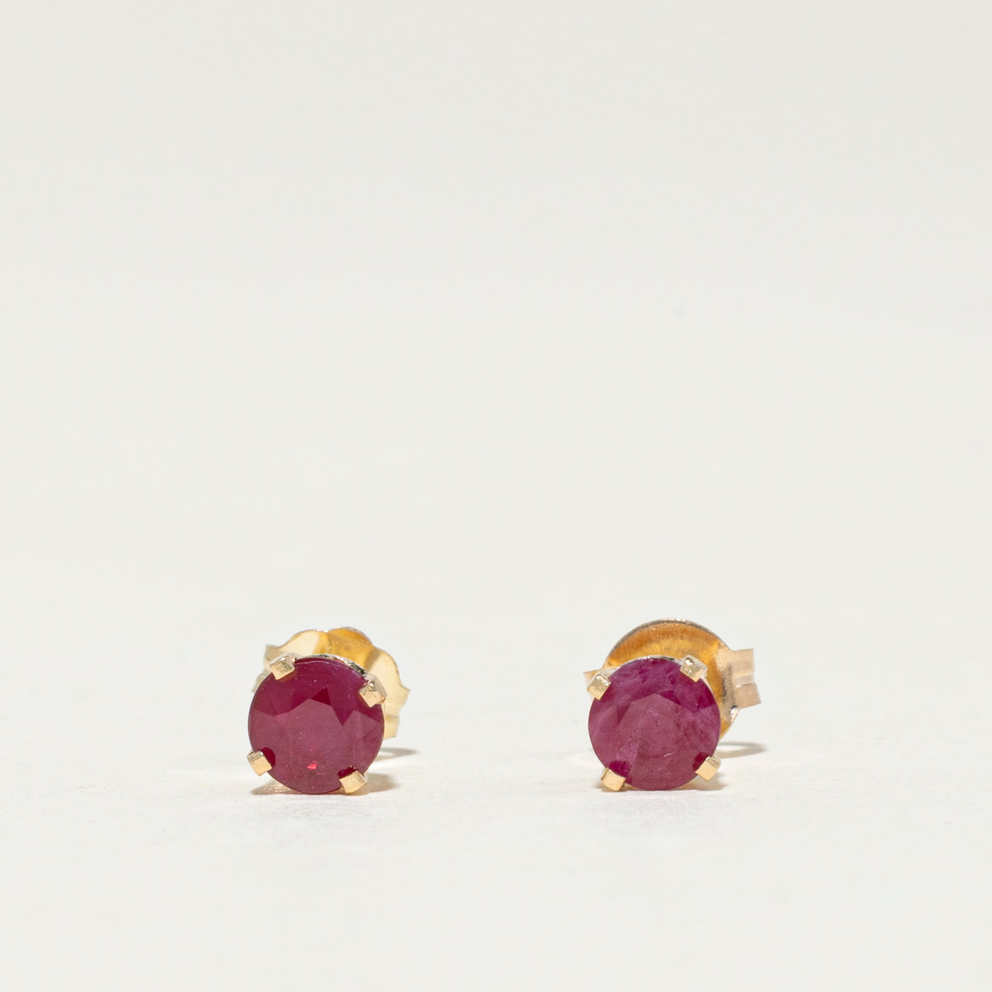 14K Round Cut Ruby Stud Earrings | 0.64ctw
