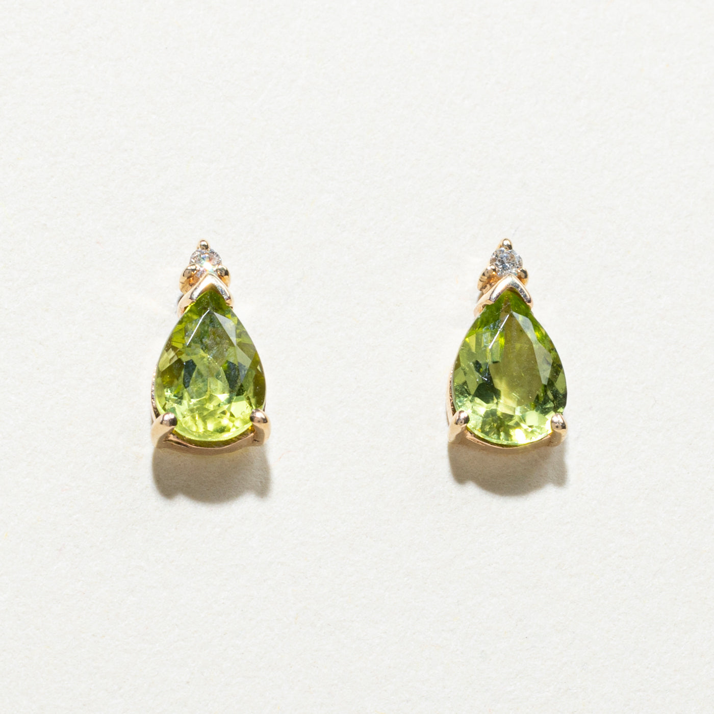 Pear Cut Peridot & Diamond Stud Earrings | 1.60ctw, 0.02ctw