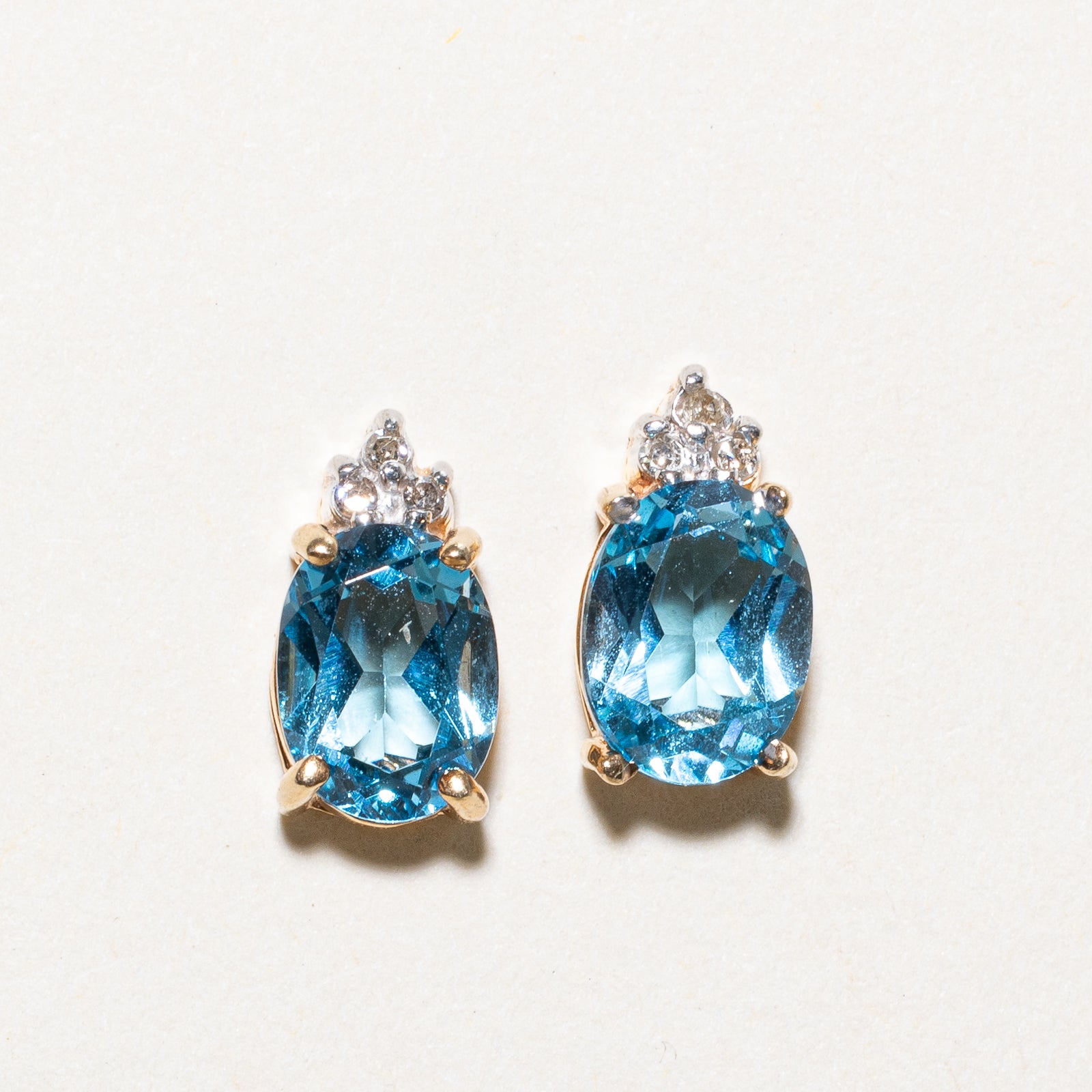 Oval Cut Blue Topaz & Diamond Stud Earrings | 3.00ctw, 0.03ctw |