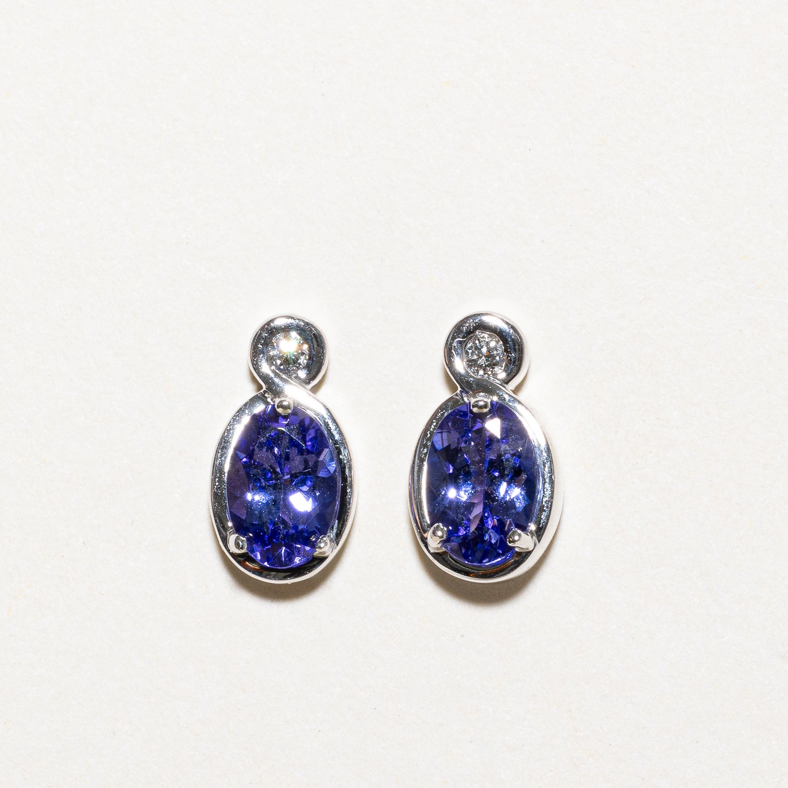 Oval Cut Tanzanite & Diamond Stud Earrings | 1.00ctw, 0.04ctw |