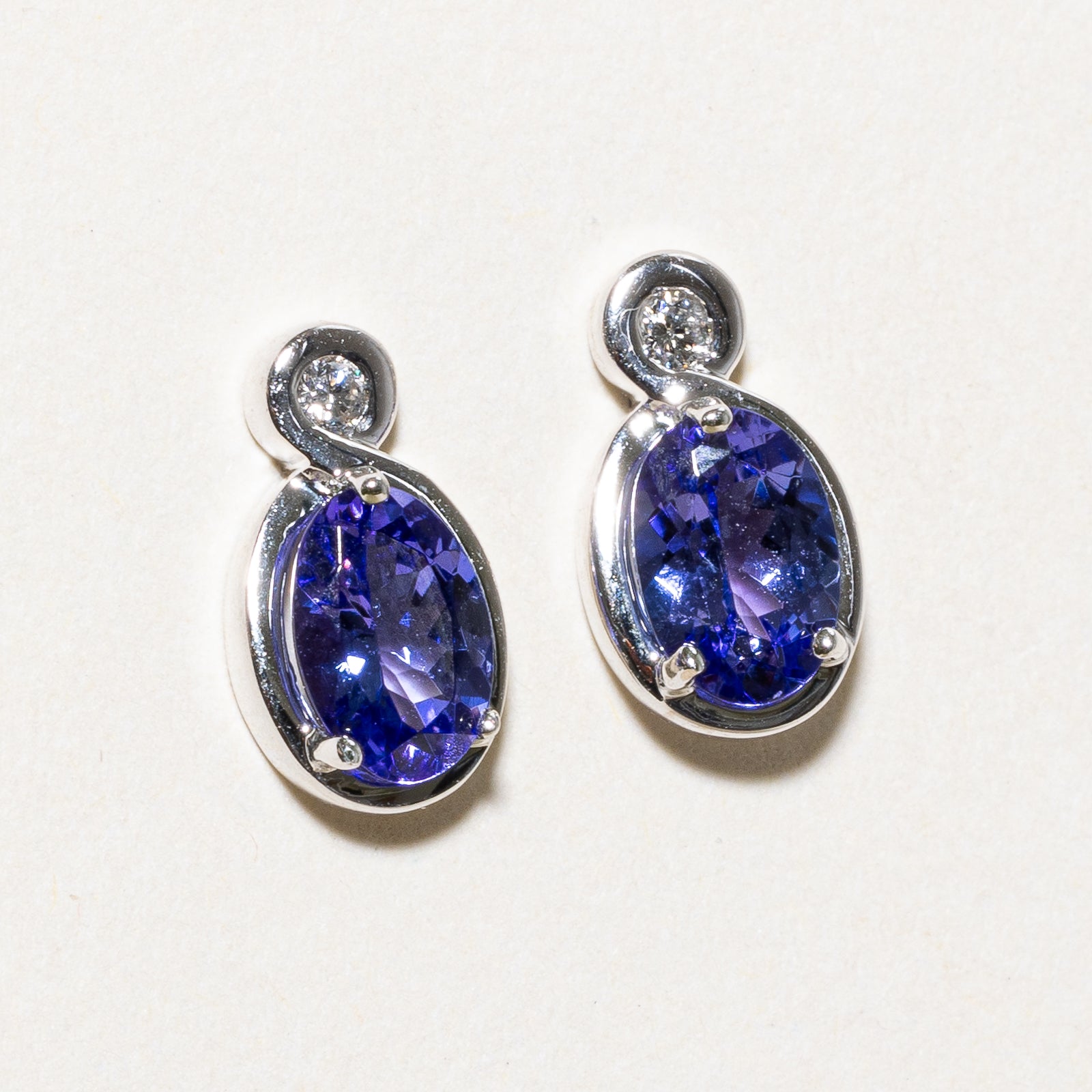 Oval Cut Tanzanite & Diamond Stud Earrings | 1.00ctw, 0.04ctw |