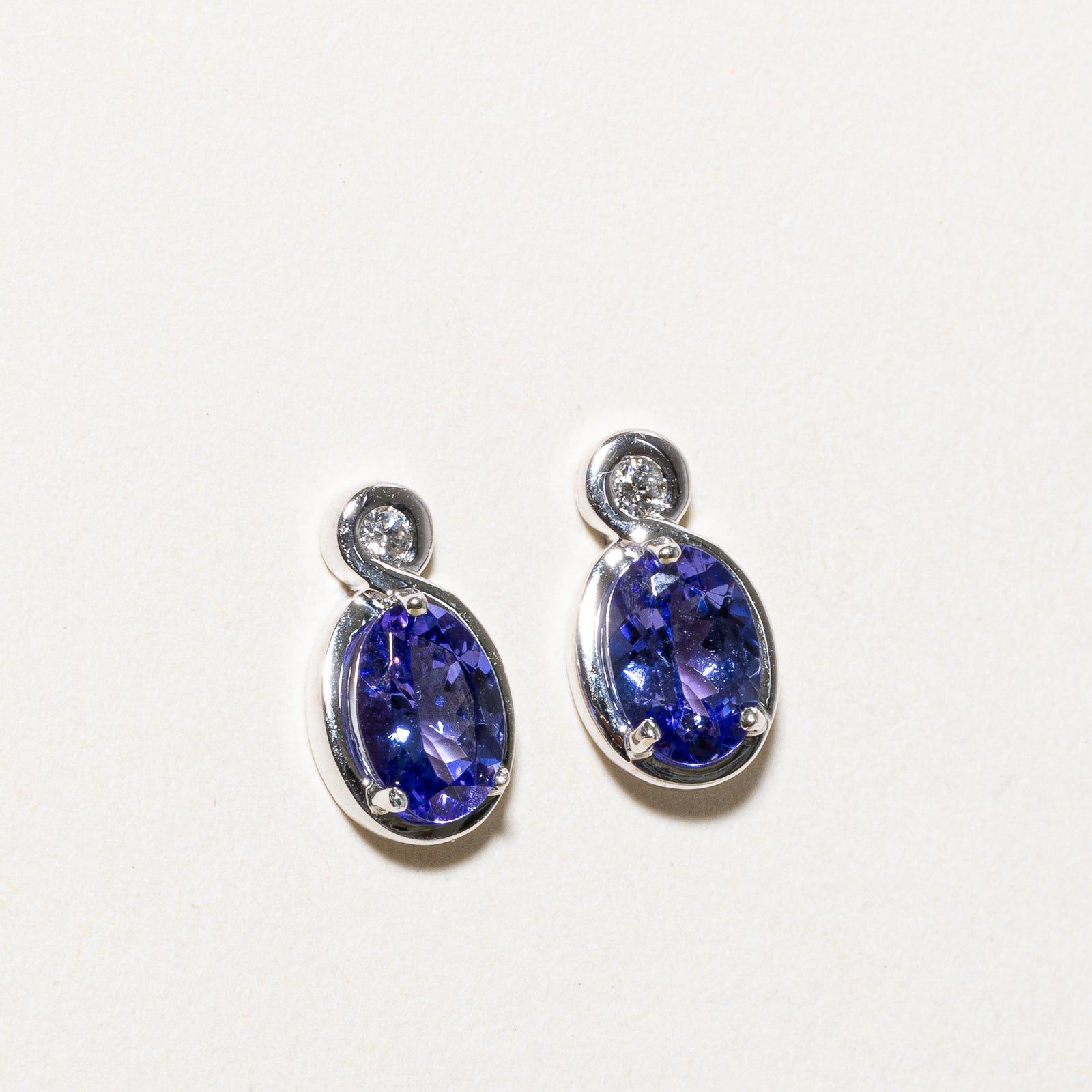 Oval Cut Tanzanite & Diamond Stud Earrings | 1.00ctw, 0.04ctw |