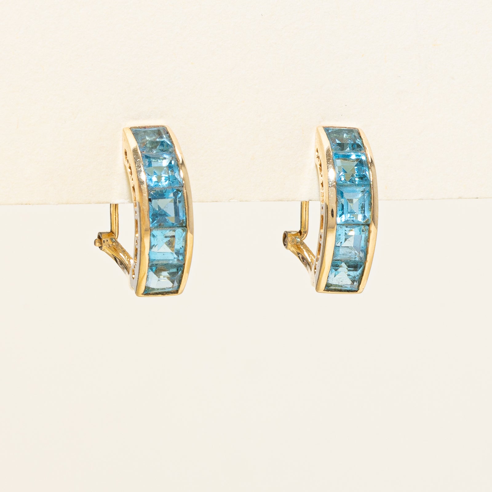 Channel Set Blue Topaz Huggie Earrings | 4.00ctw