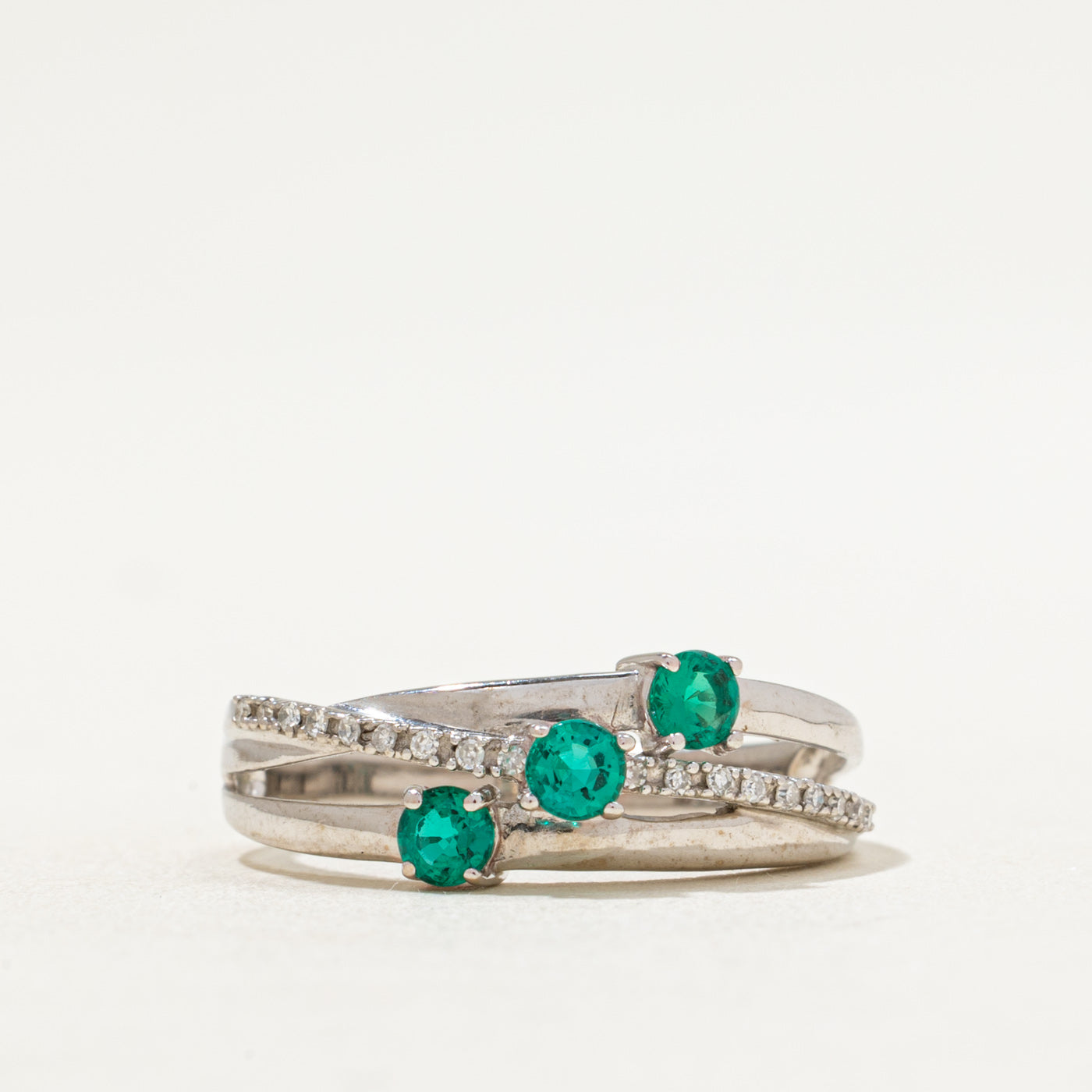Synthetic Emerald & Diamond Crossover Ring | 0.30ctw, 0.04ctw | SZ 7.25