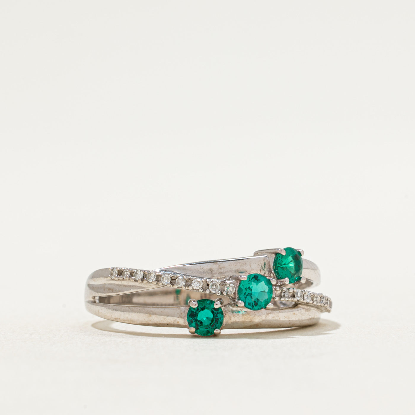 Synthetic Emerald & Diamond Crossover Ring | 0.30ctw, 0.04ctw | SZ 7.25