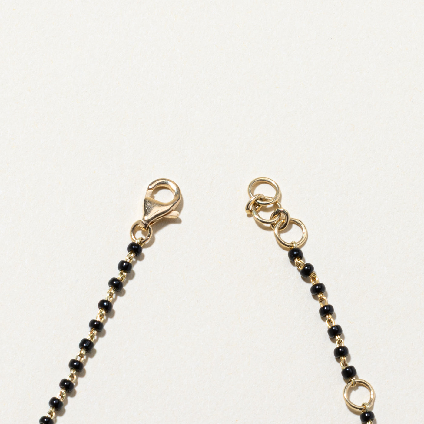 14K Black Glass Bead & Diamond Infinity Bracelet | 1.80ctw, 0.06ctw | 6"