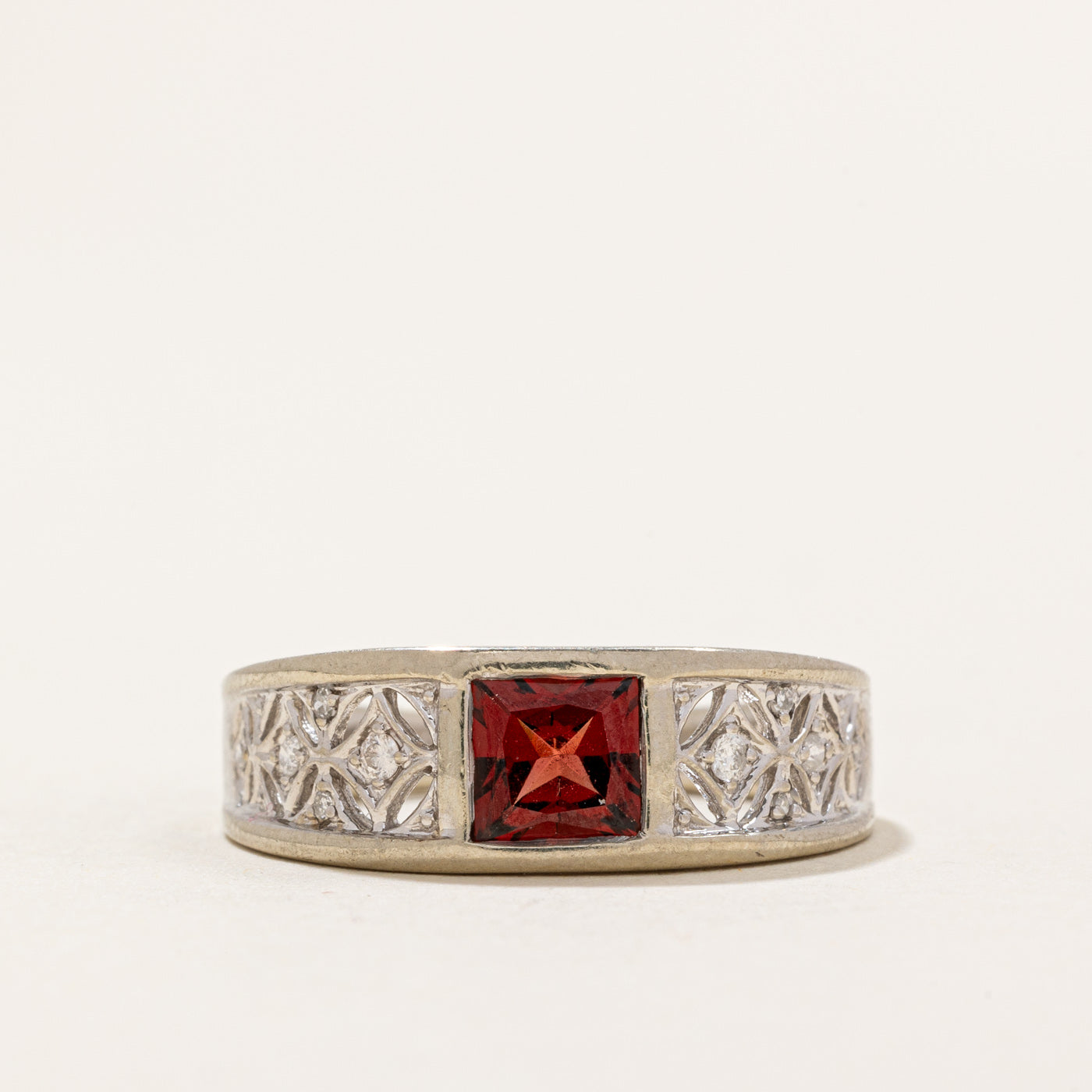 Garnet & Diamond Ring | 0.70ct, 0.05ctw | SZ 7