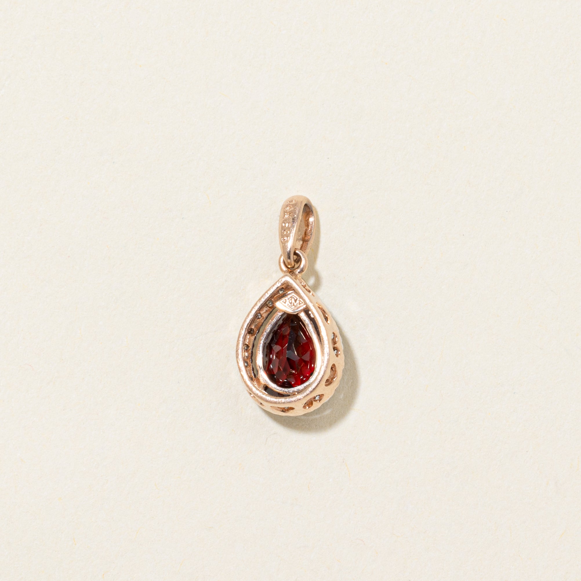 Pear Cut Garnet & Diamond Halo Pendant | 1.25ct | 0.07ctw