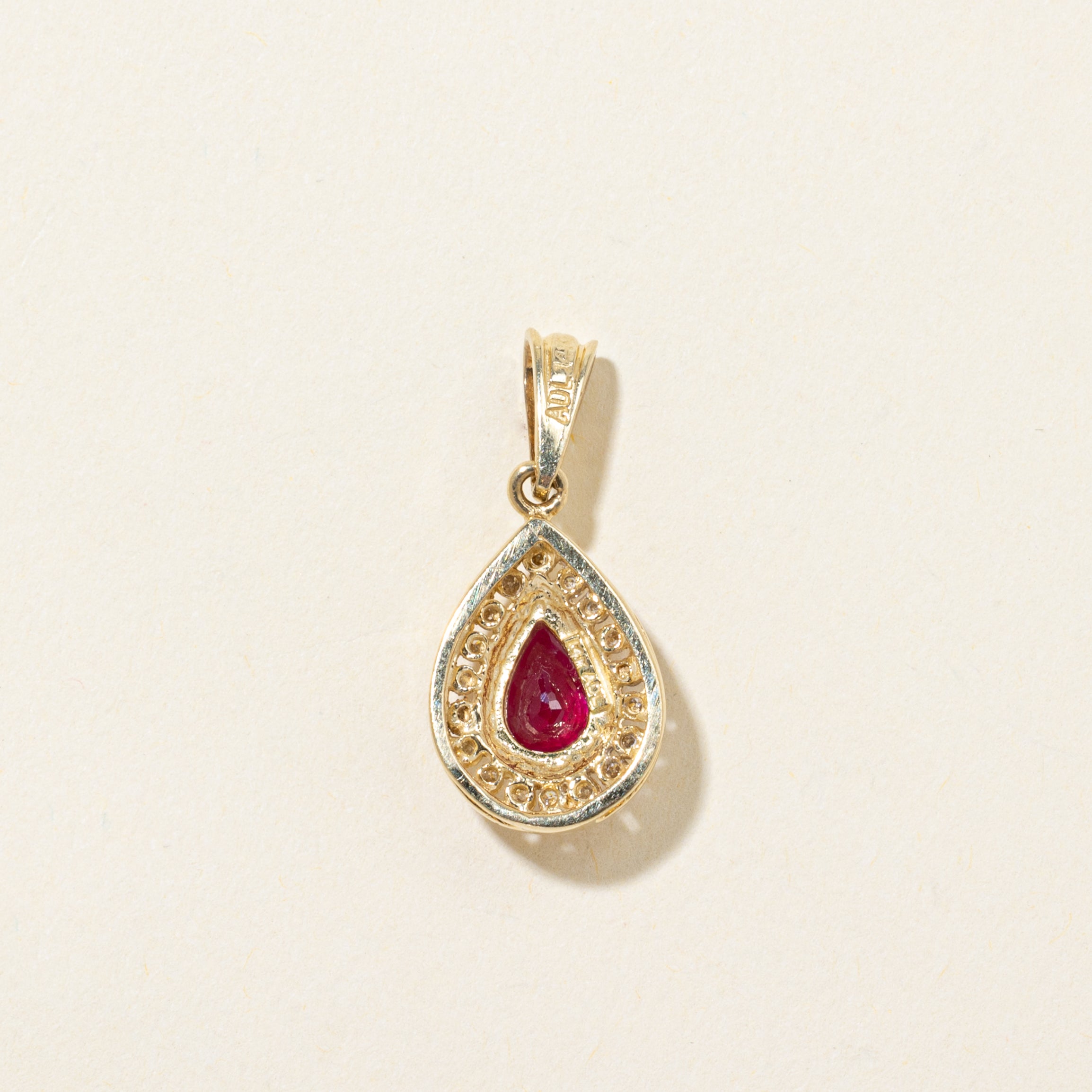 Pear Cut Ruby & Diamond Halo Pendant | 0.90ct, 0.16ctw