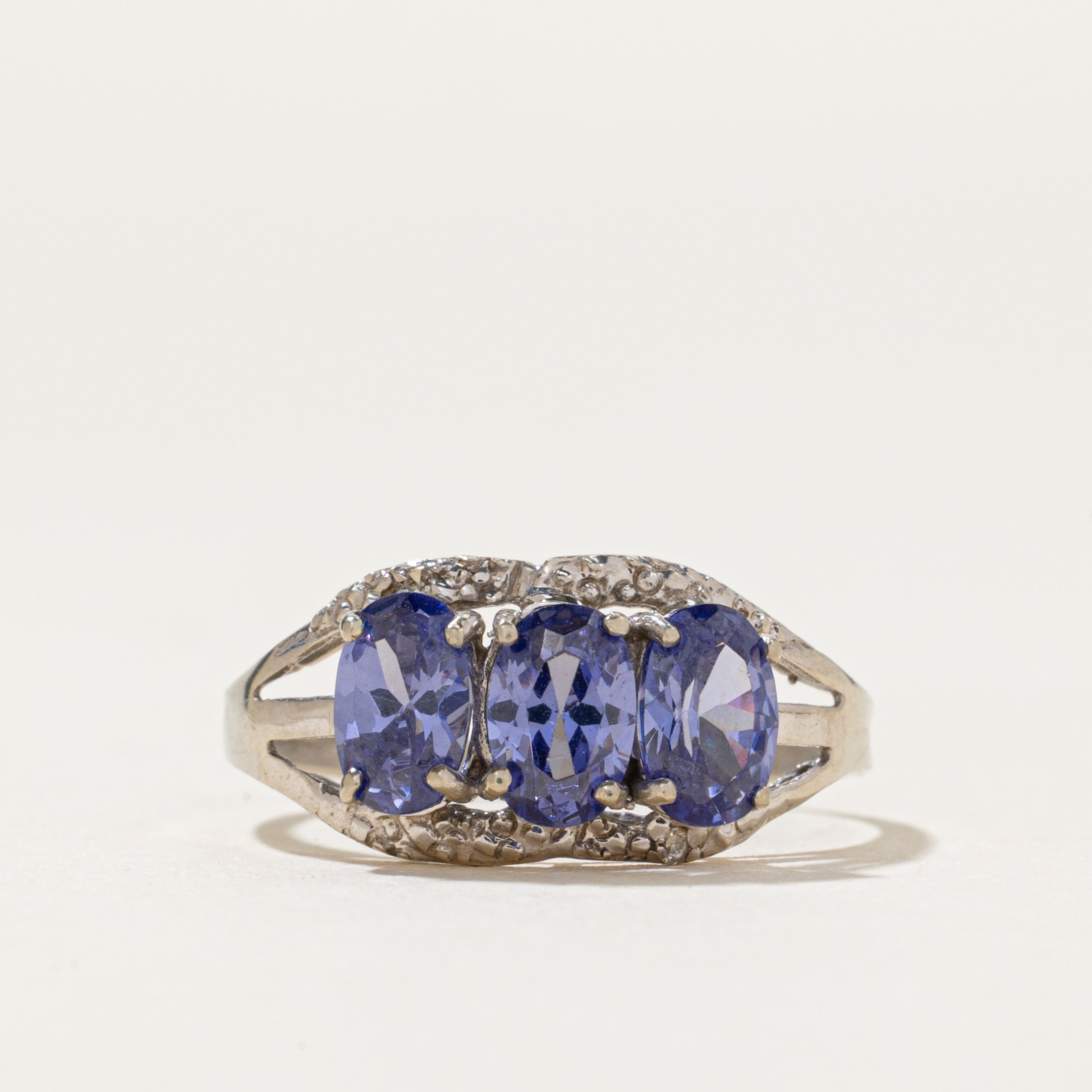 Three Stone Tanzanite & Diamond Ring | 1.10ctw, 0.01ctw | SZ 6.75