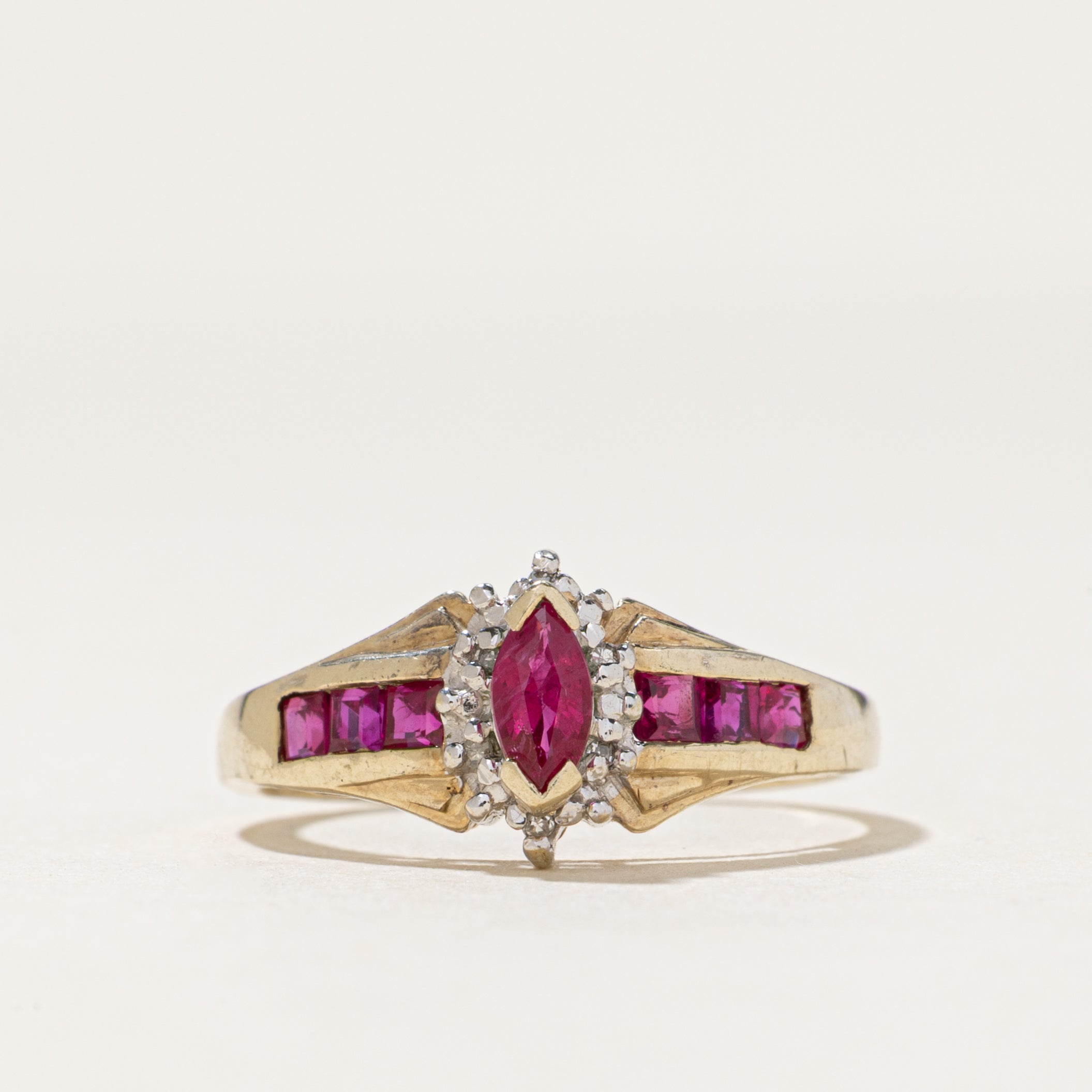 Marquise Cut Ruby & Diamond Ring | 0.56ctw, 0.03ctw | SZ 7