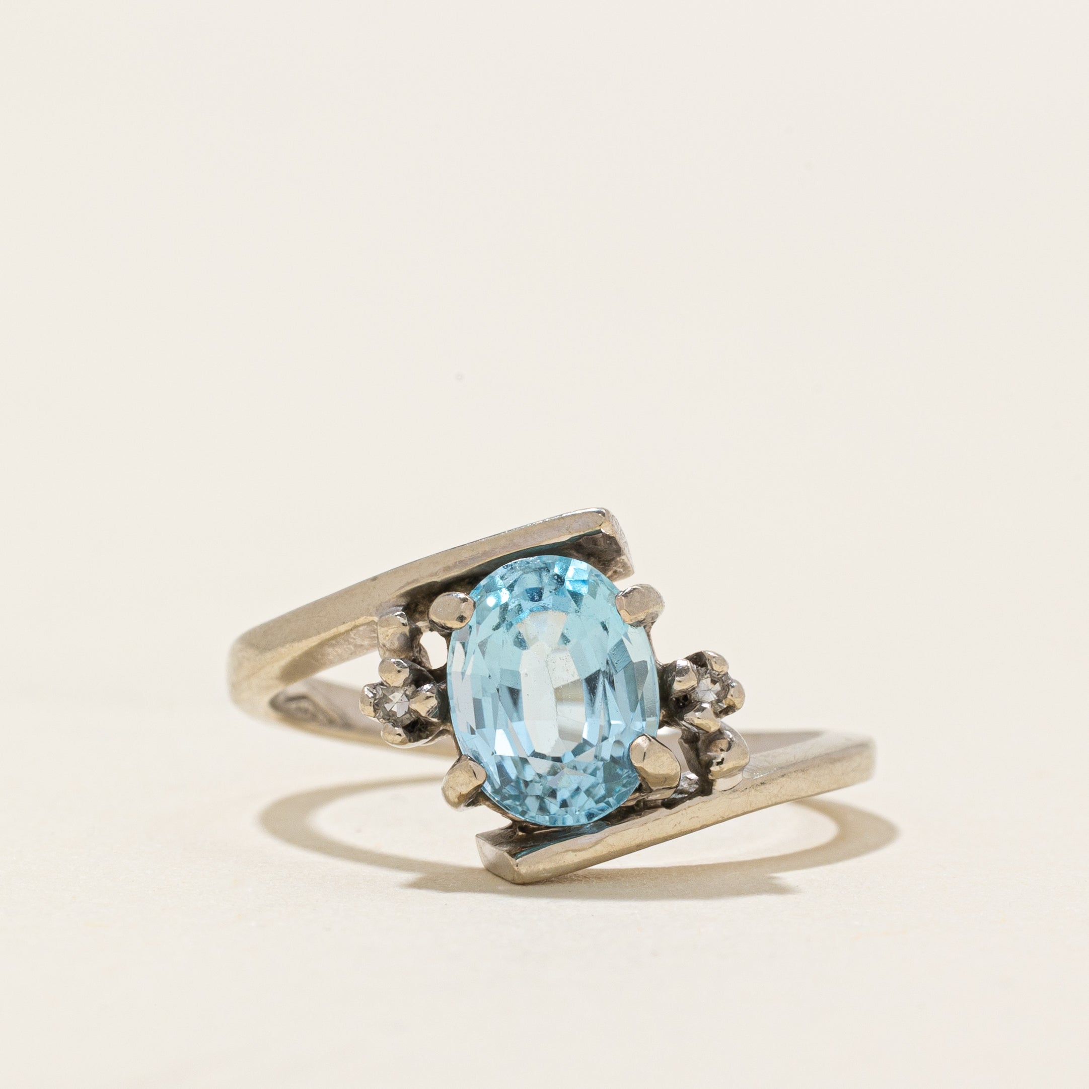 Oval Cut Blue Topaz & Diamond Bypass Ring | 1.73ct, 0.02ctw | SZ 6