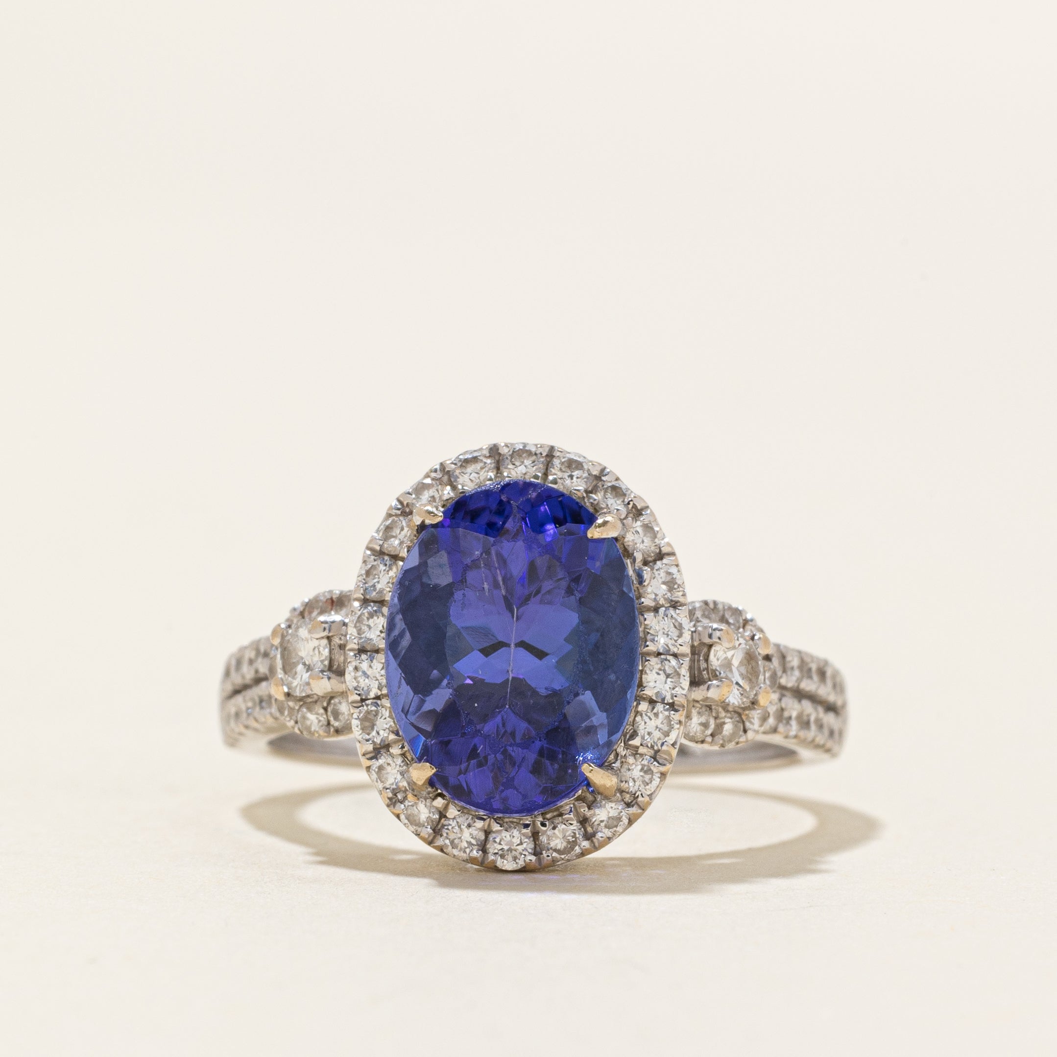 18k Oval Cut Tanzanite & Diamond Halo Ring | 3.93ct, 0.77ctw | SZ 7