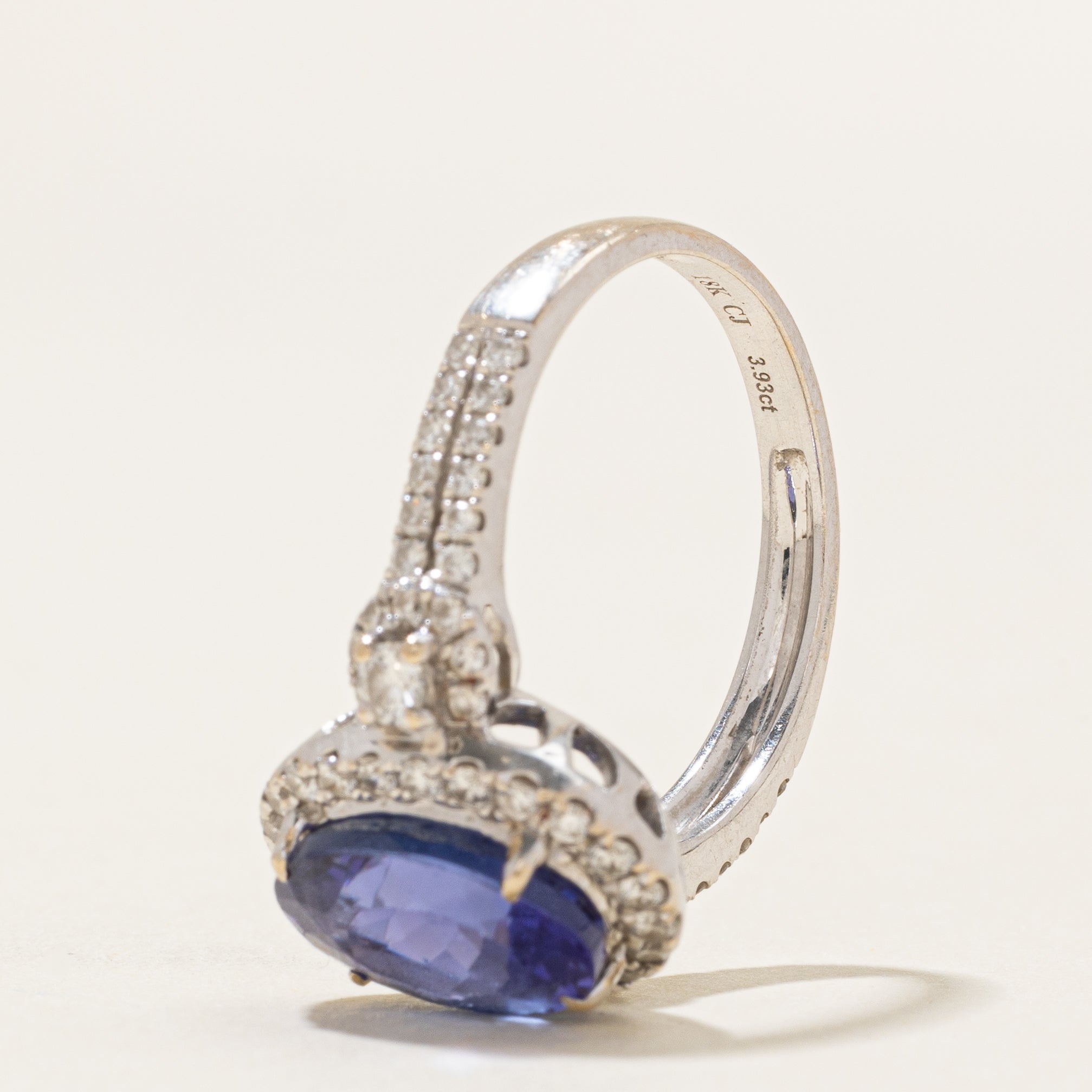 18k Oval Cut Tanzanite & Diamond Halo Ring | 3.93ct, 0.77ctw | SZ 7