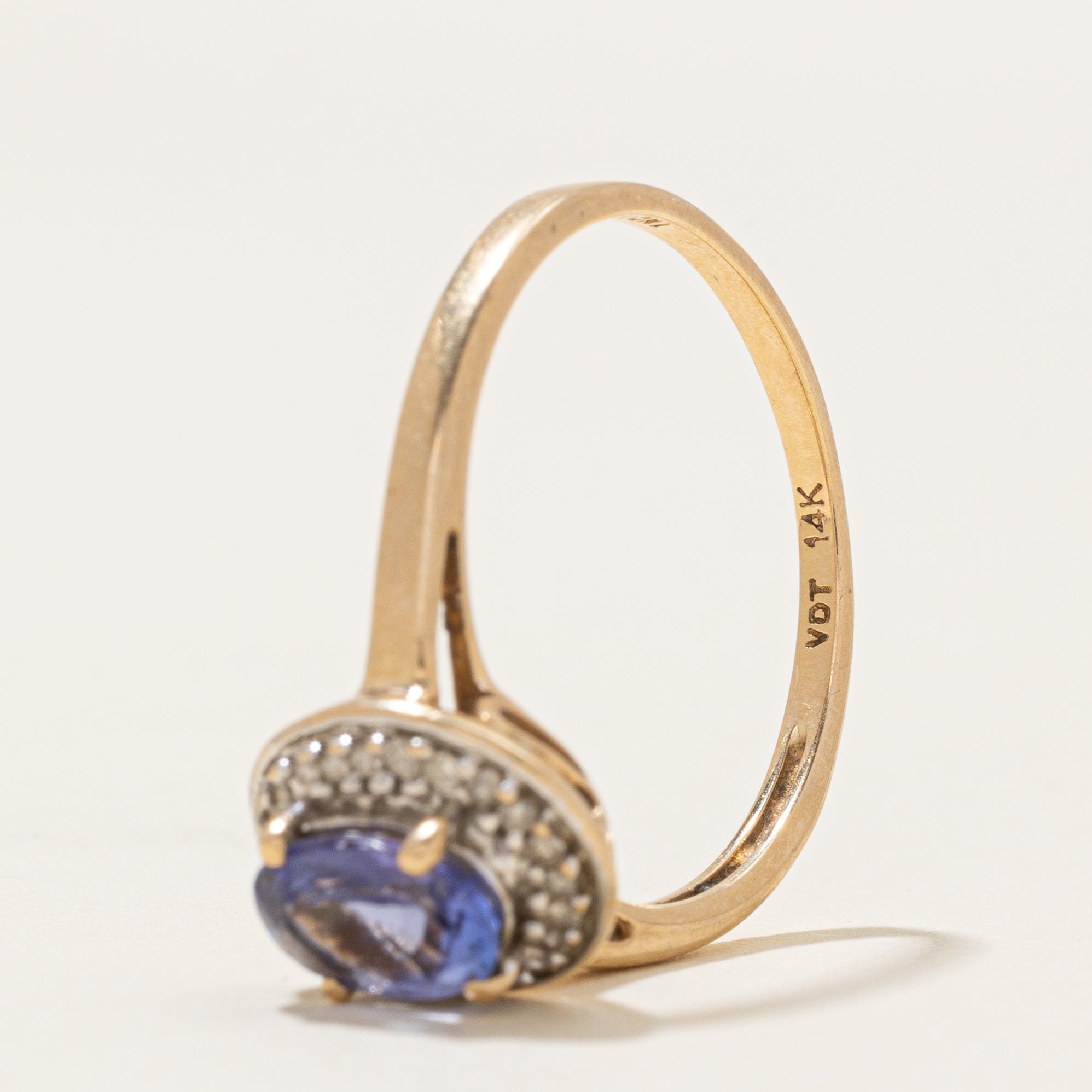 Oval Cut Tanzanite & Diamond Halo Ring | 0.95ct, 0.11ctw | SZ 9.25