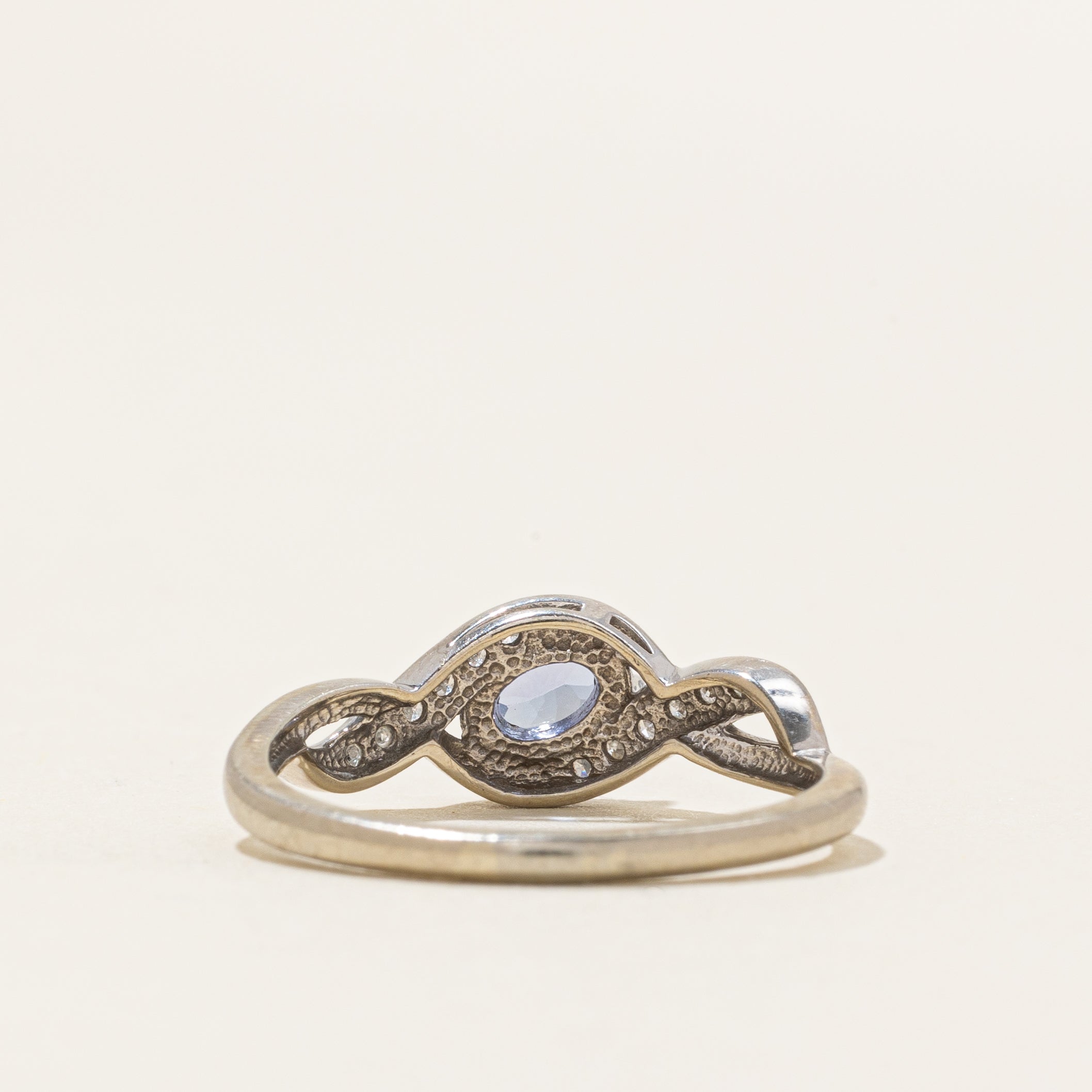 Oval Cut Tanzanite & Diamond Cross Over Ring | 0.41ct, 0.06ct | SZ 8