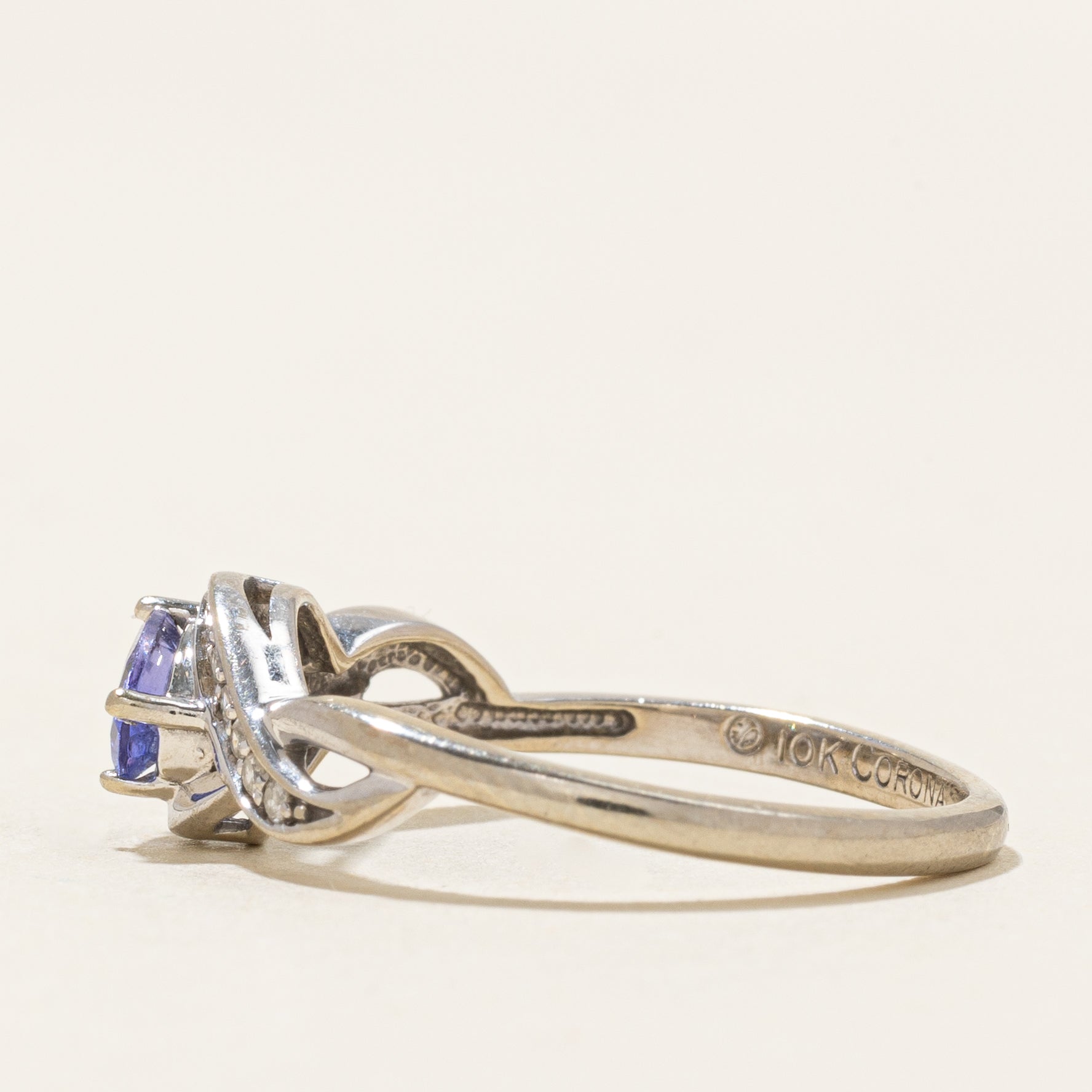 Oval Cut Tanzanite & Diamond Cross Over Ring | 0.41ct, 0.06ct | SZ 8