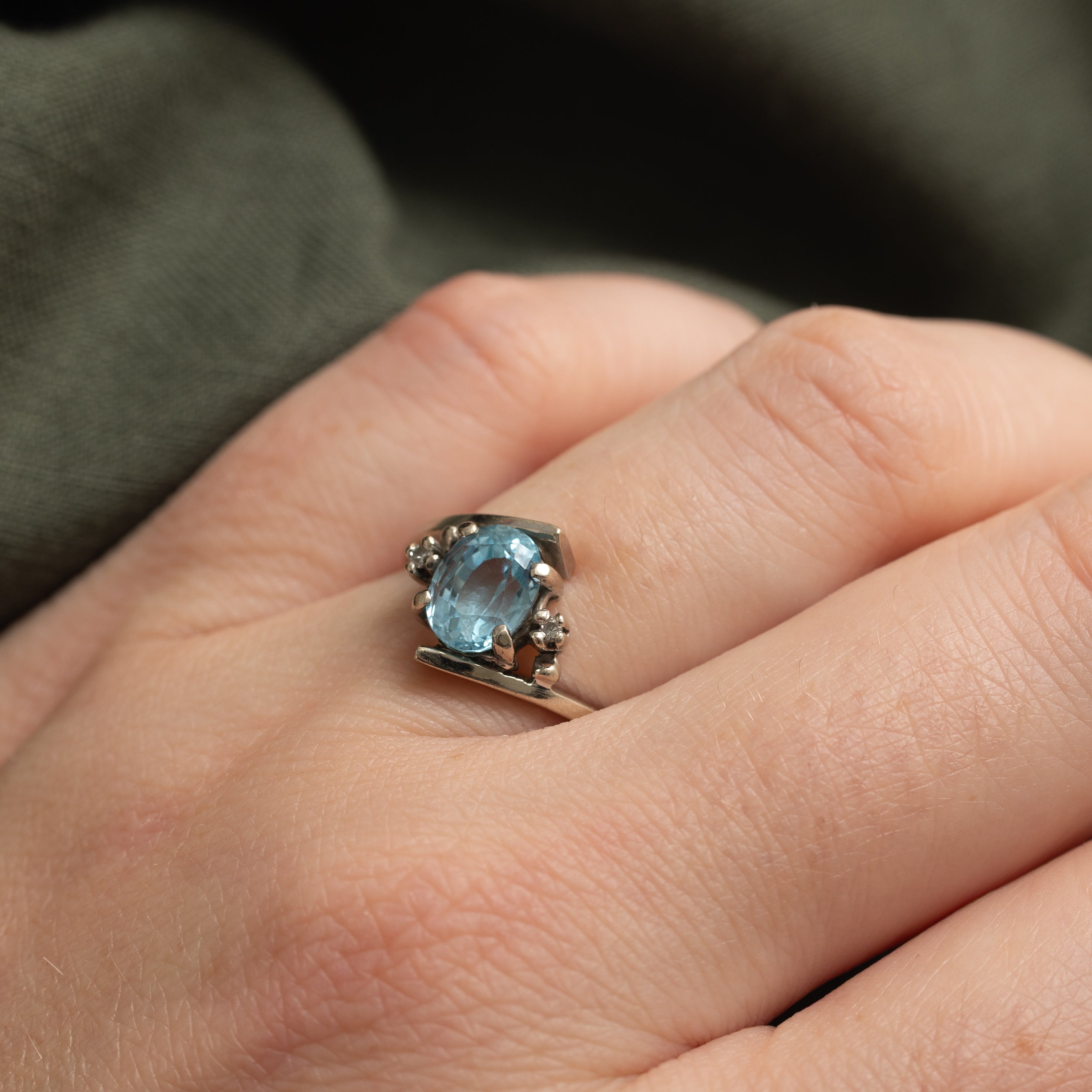 Oval Cut Blue Topaz & Diamond Bypass Ring | 1.73ct, 0.02ctw | SZ 6