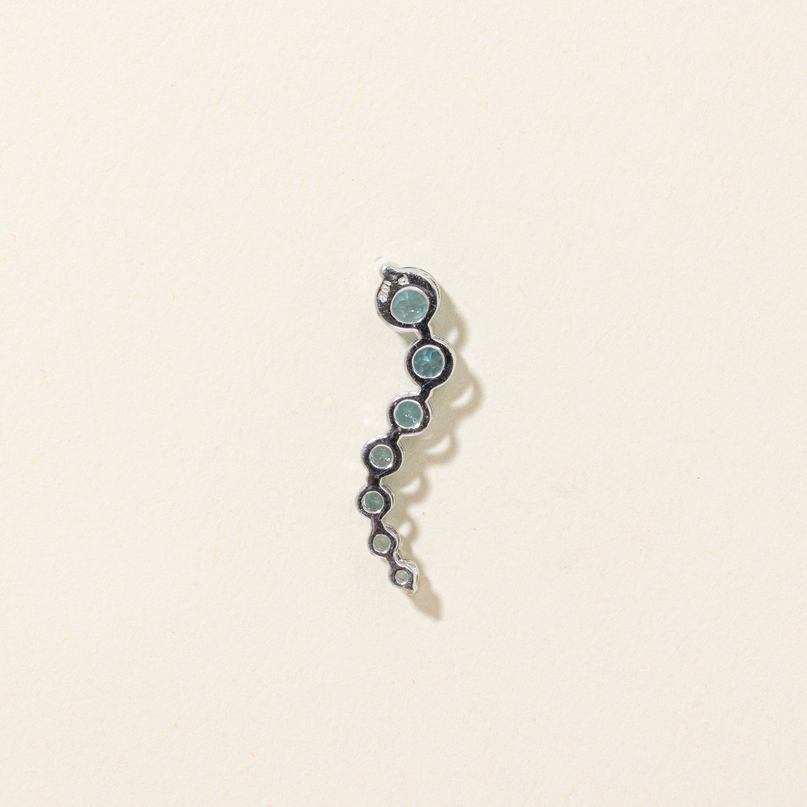 White Gold Blue Topaz Journey Pendant | 0.60ctw