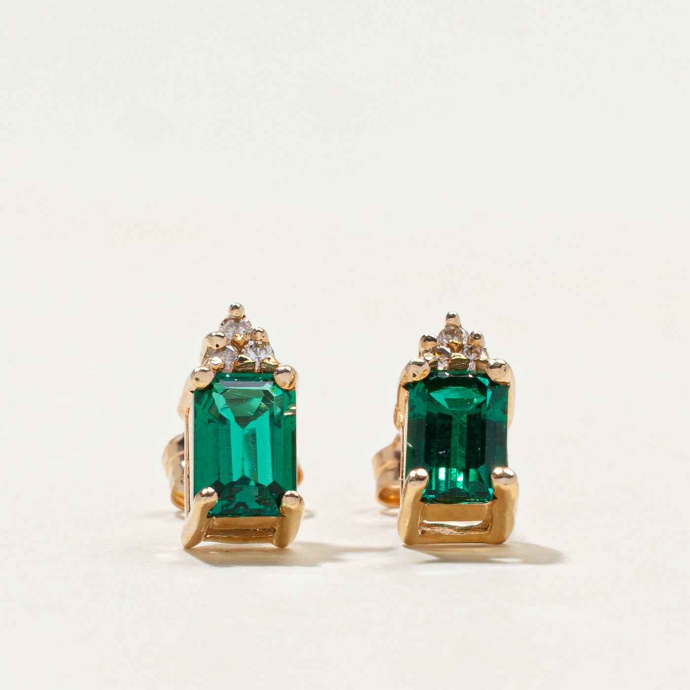 14k Synthetic Emerald & Natural Diamond Stud Earrings | 1.00ctw, 0.03ctw