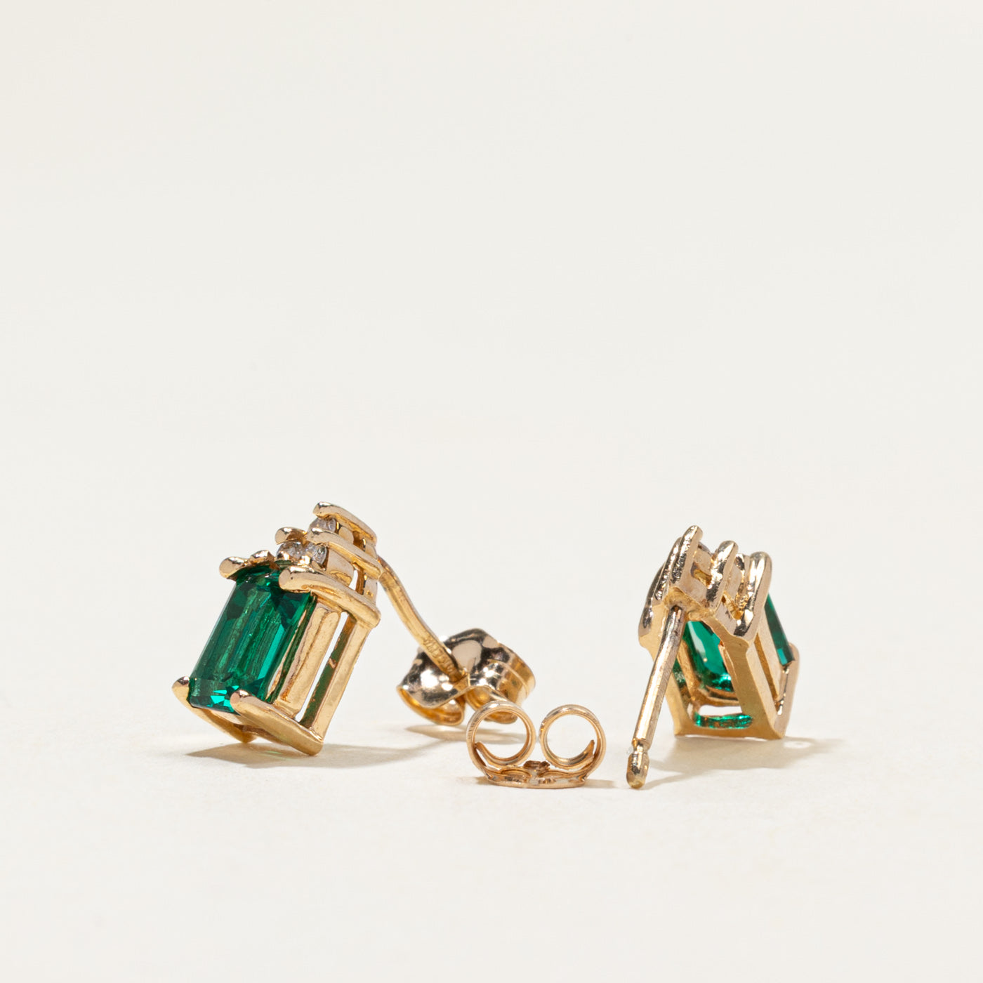 14k Synthetic Emerald & Natural Diamond Stud Earrings | 1.00ctw, 0.03ctw