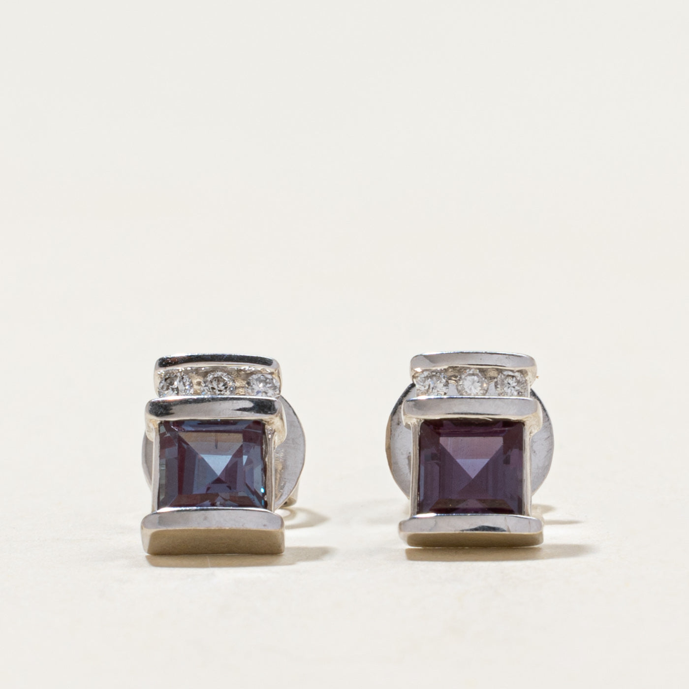 10k Synthetic Sapphire & Natural Diamond Stud Earrings | 0.65ctw, 0.03ctw
