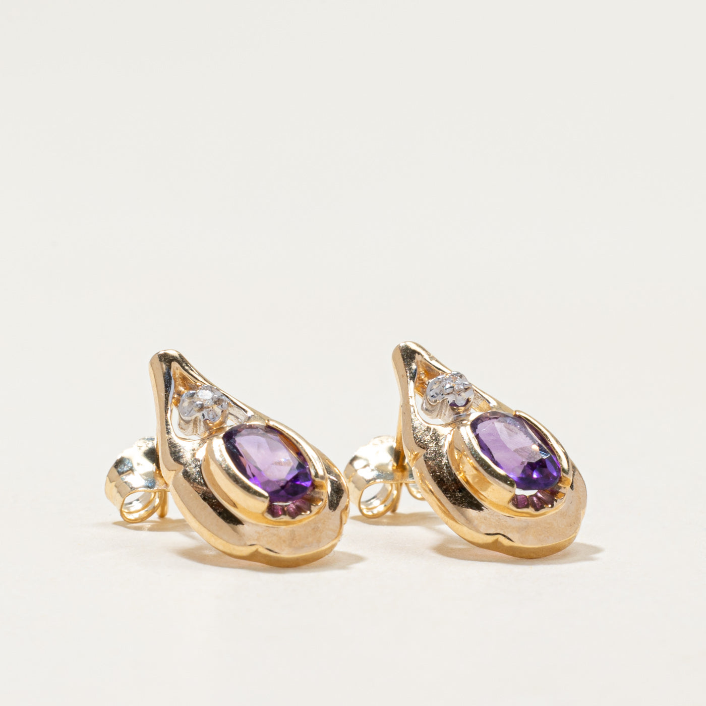 14k Amethyst & Diamond Pear Shaped Stud Earrings | 0.60ctw, 0.02ctw