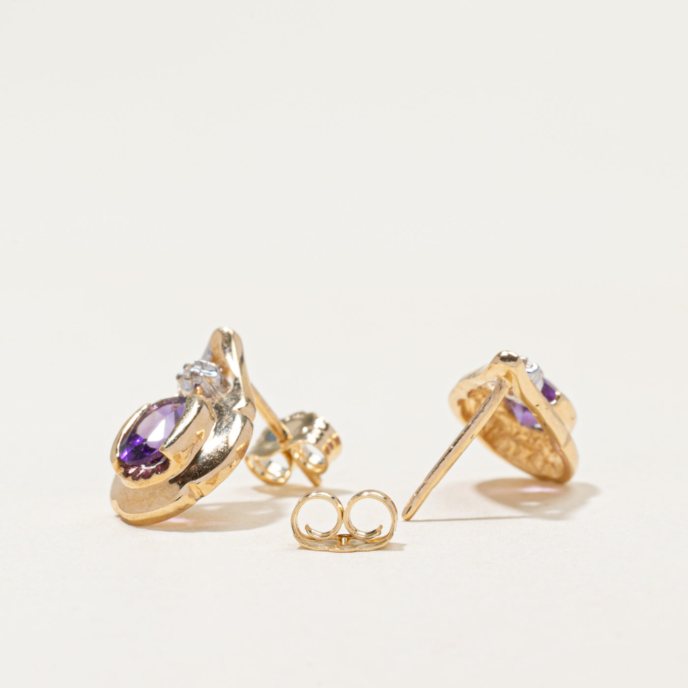 14k Amethyst & Diamond Pear Shaped Stud Earrings | 0.60ctw, 0.02ctw