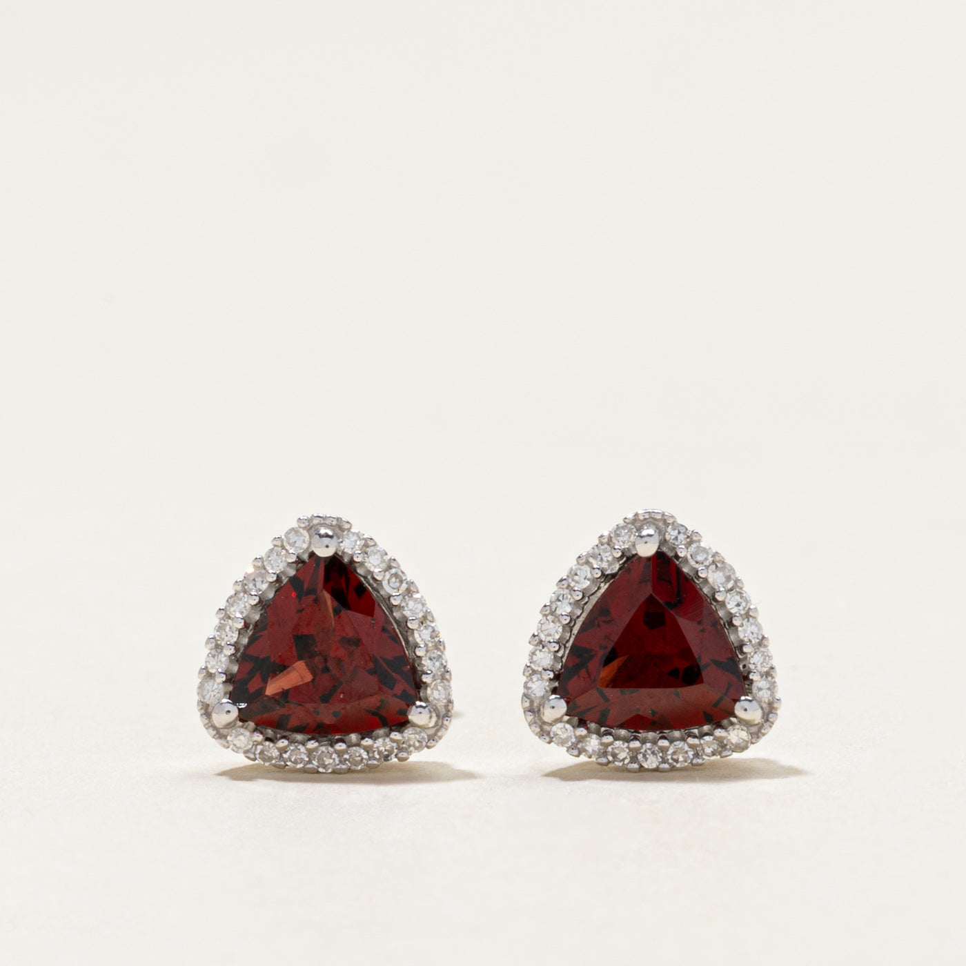 Trillion Cut Garnet & Diamond Halo Stud Earrings | 1.10ctw, 0.05ctw