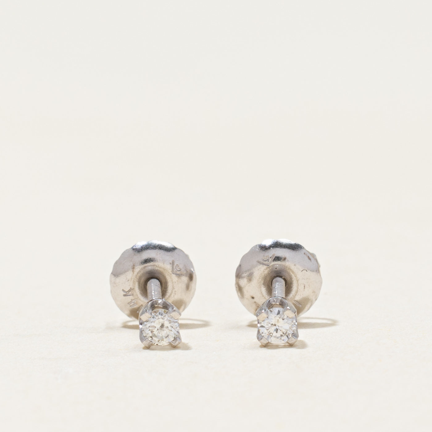 Boucles d'oreilles puces en or 14 carats serties de diamants | 0,08 ct