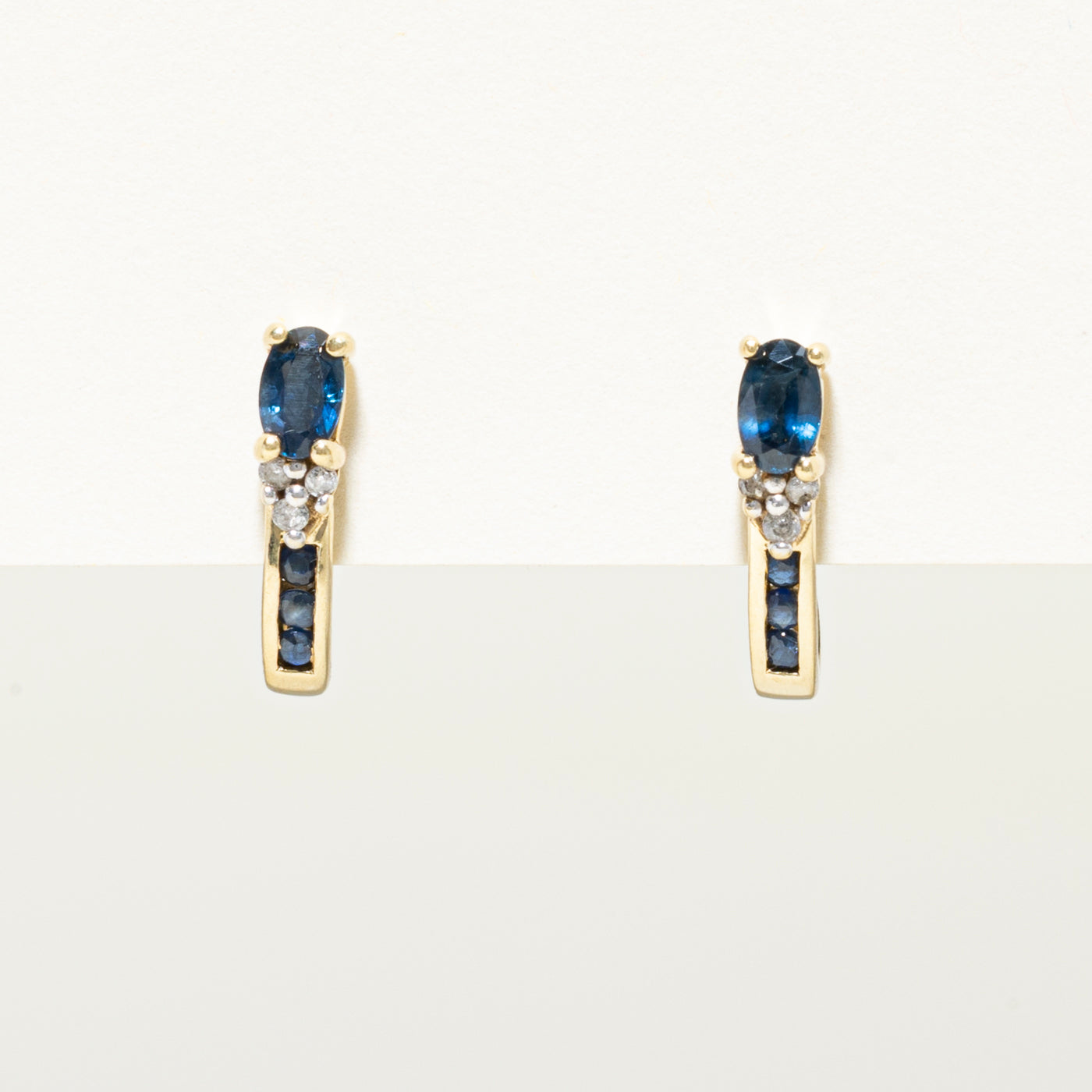Oval Cut Sapphire & Diamond Huggie Earrings | 0.70ctw, 0.06ct