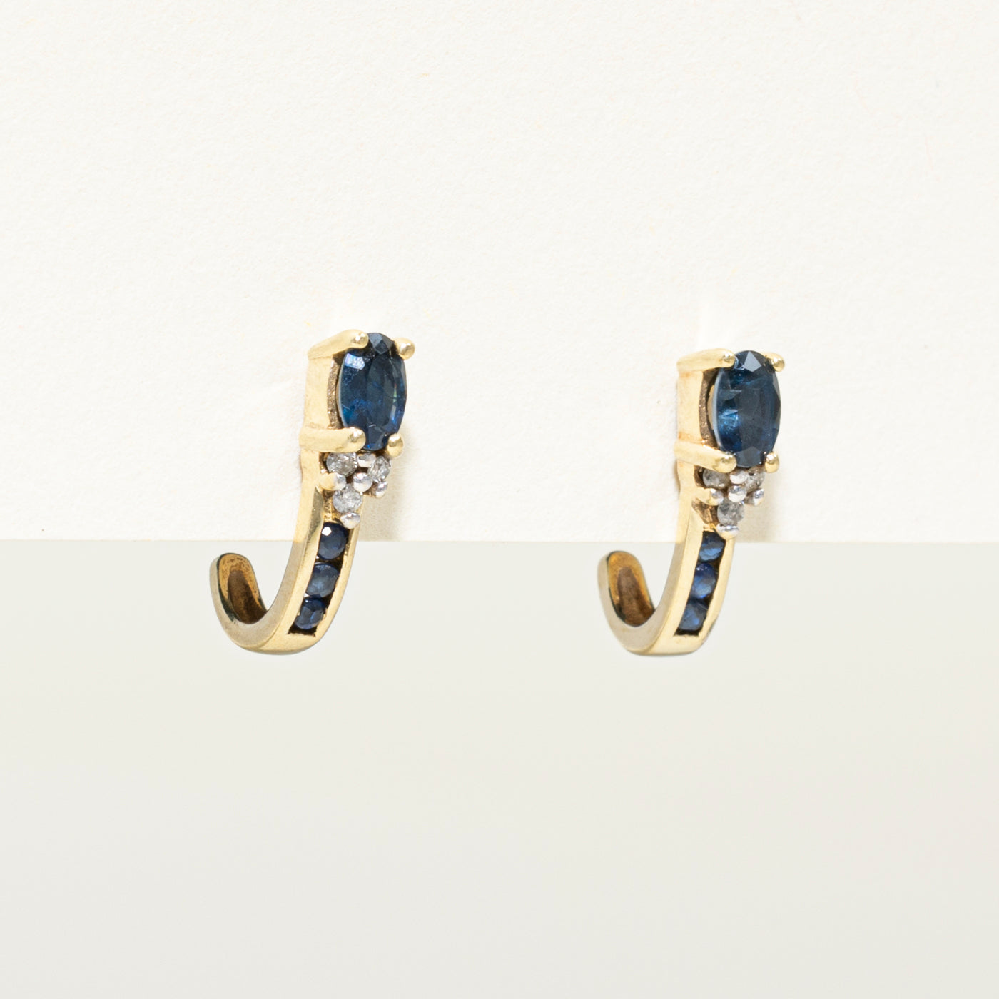 Oval Cut Sapphire & Diamond Huggie Earrings | 0.70ctw, 0.06ct