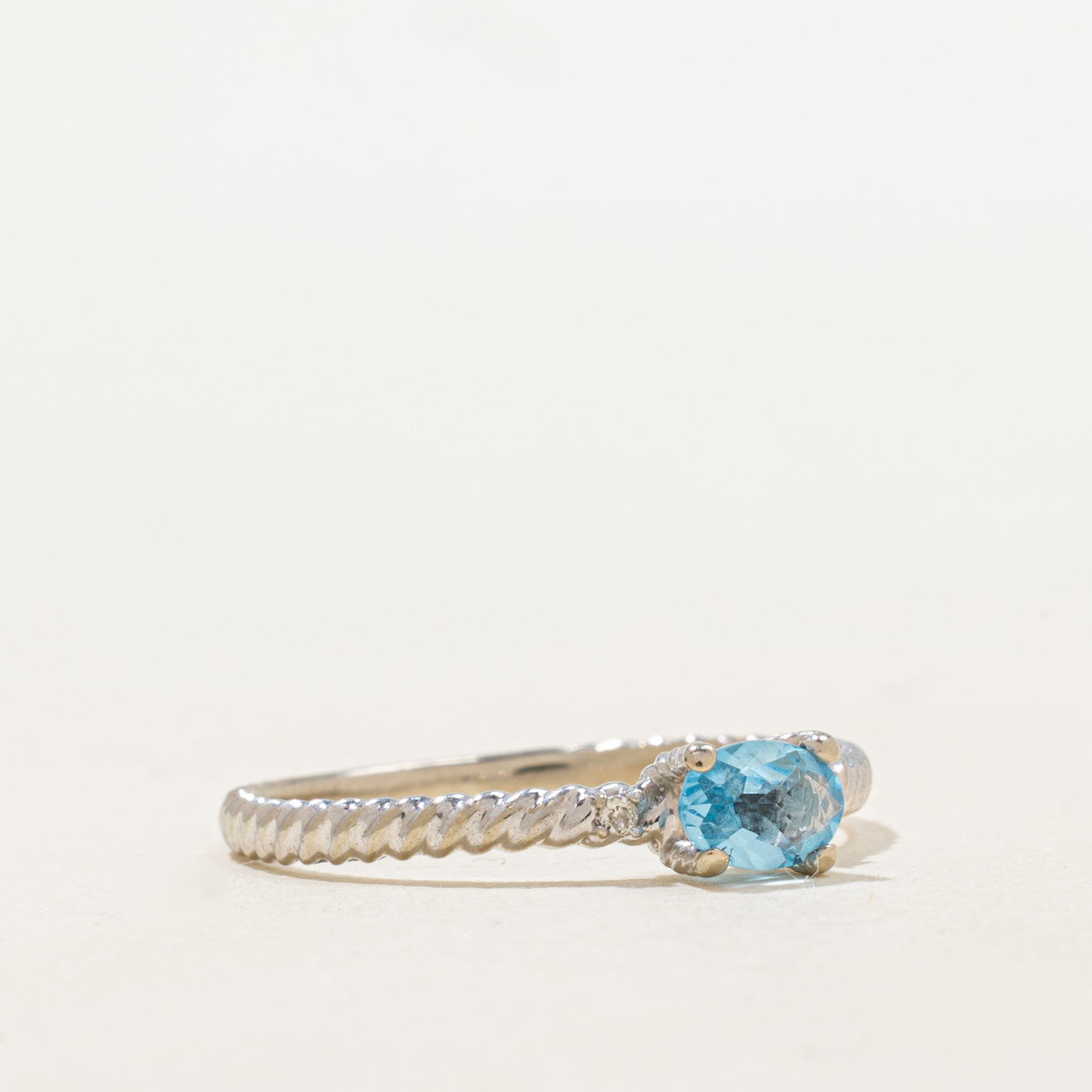 East West Checkerboard Cut Blue Topaz Ring | 0.35ct | SZ 8.5 |