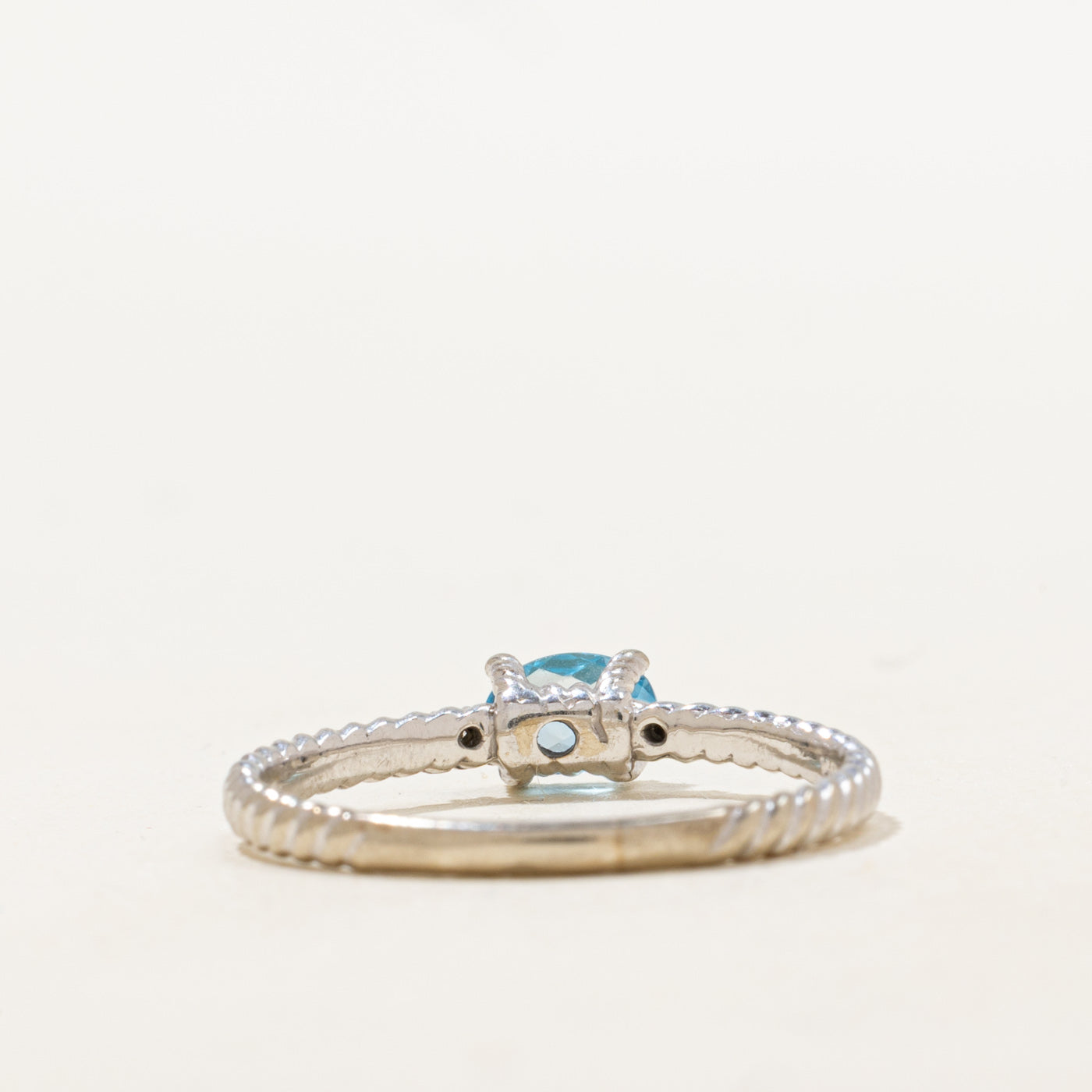 East West Checkerboard Cut Blue Topaz Ring | 0.35ct | SZ 8.5 |