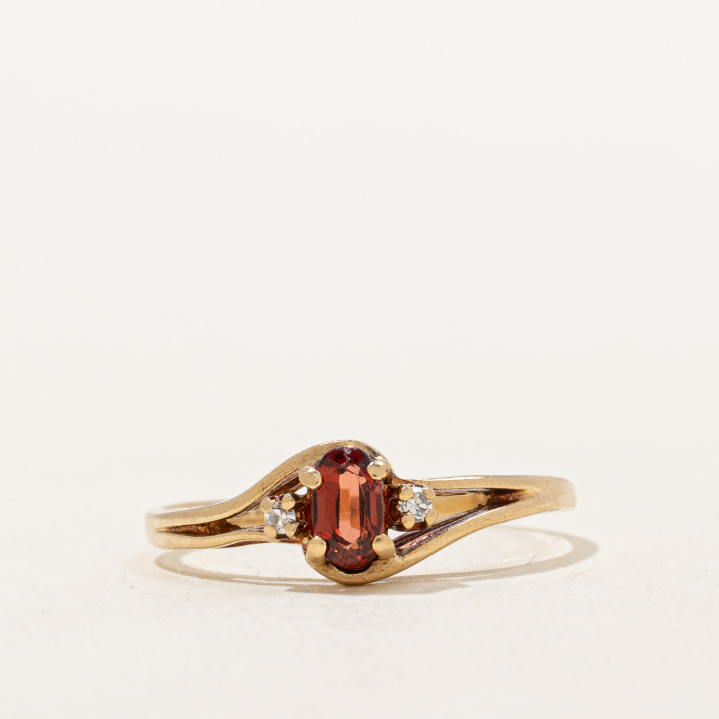 Garnet & Diamond Openwork Bypass Ring | 0.26ct, 0.01ctw | SZ 6.0 |