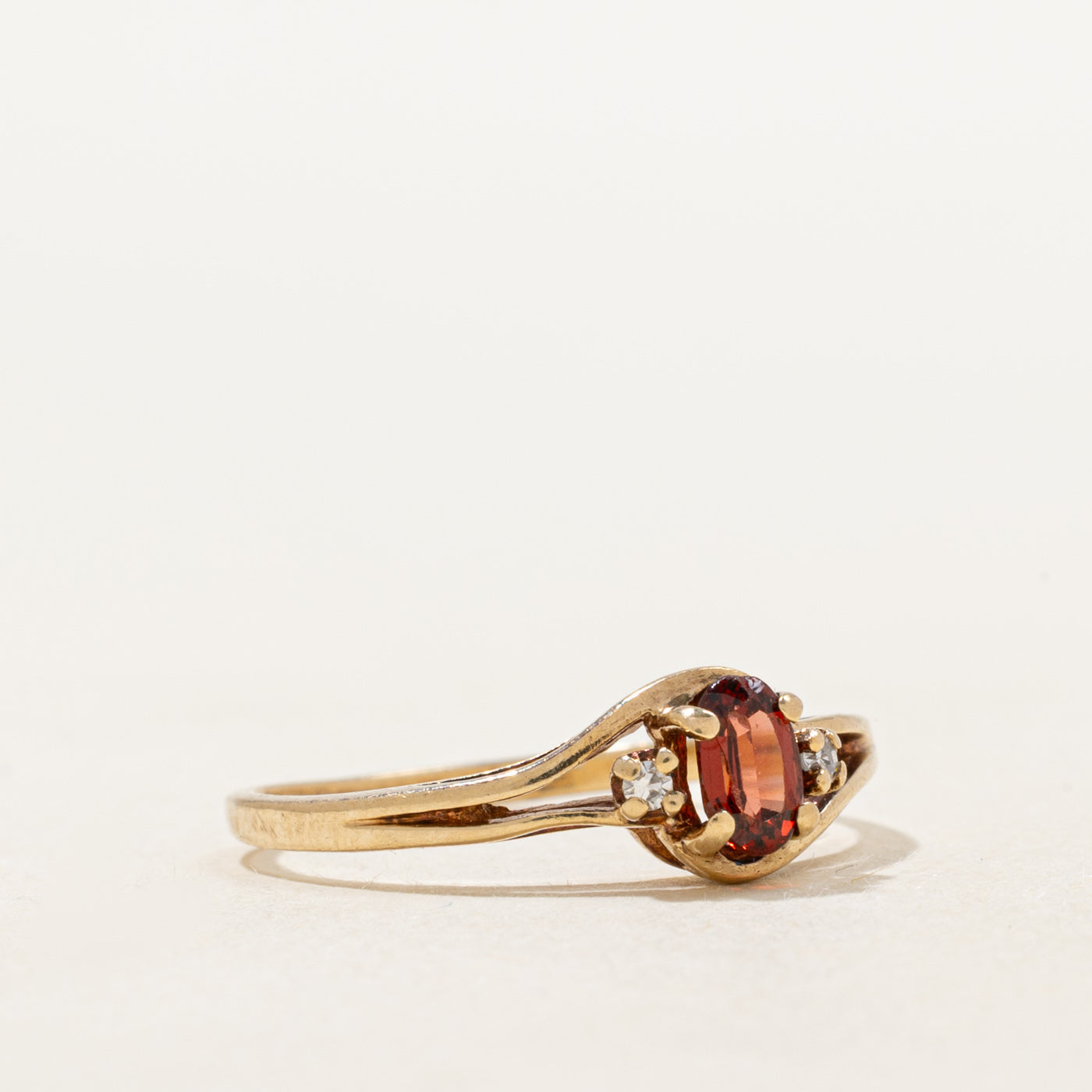 Garnet & Diamond Openwork Bypass Ring | 0.26ct, 0.01ctw | SZ 6.0 |