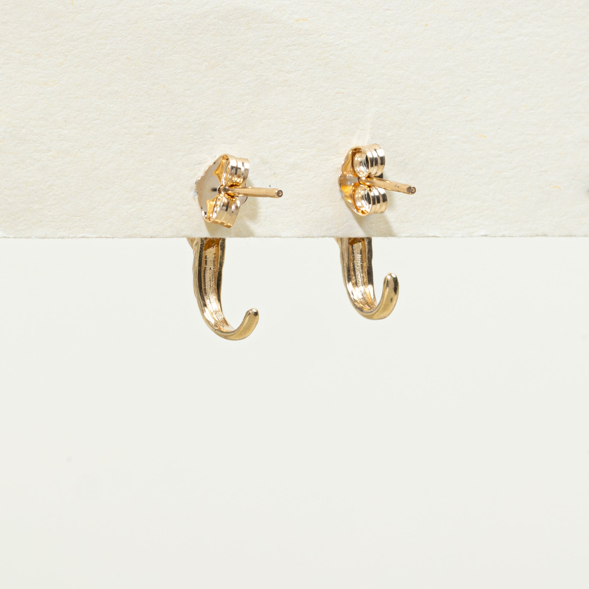 Boucles d'oreilles pendantes incurvées serties de topazes bleues et de diamants | 0,40 ct, 0,02 ct