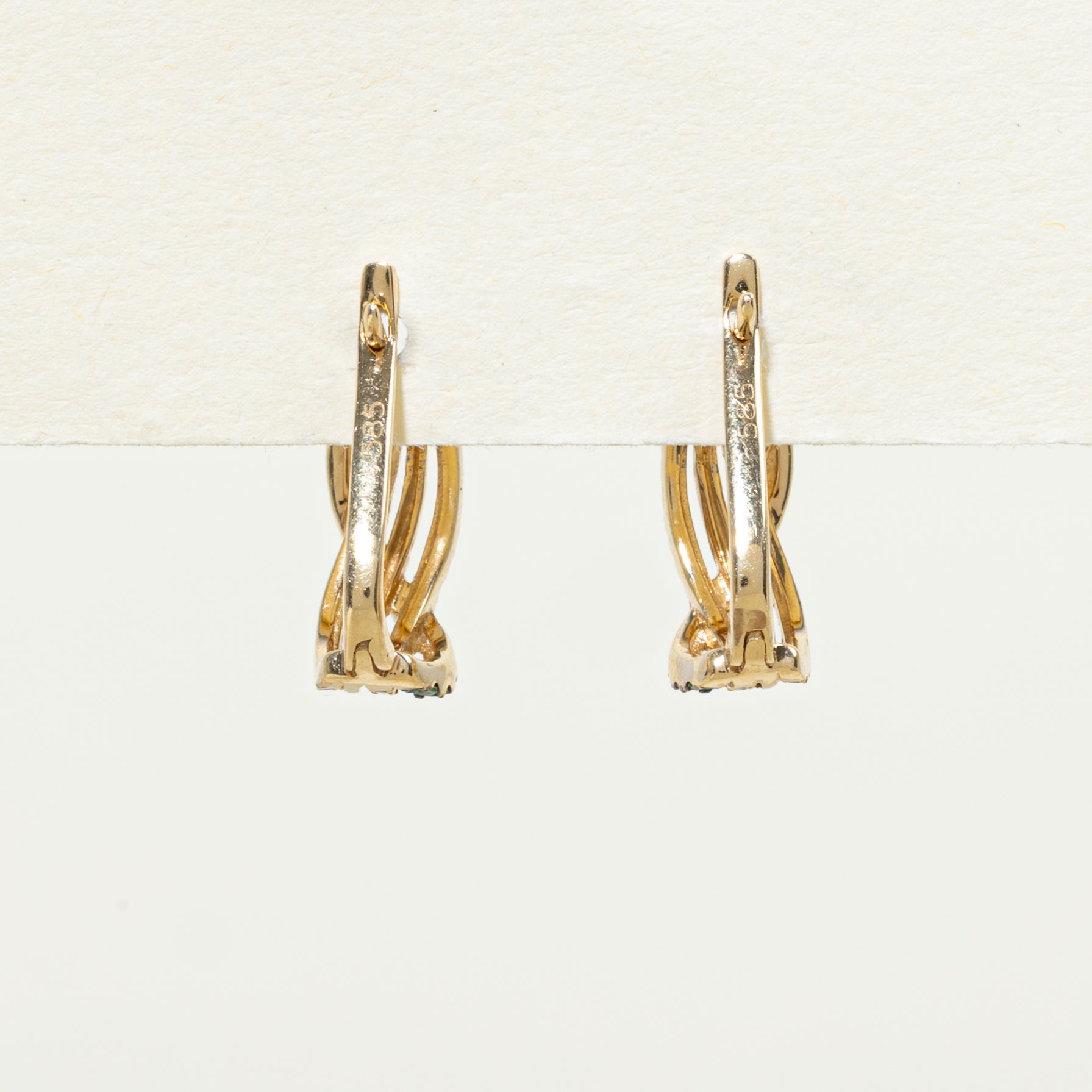 Boucles d'oreilles créoles torsadées en diamants et grenats tsavorites | 0,17 ct, 0,14 ct
