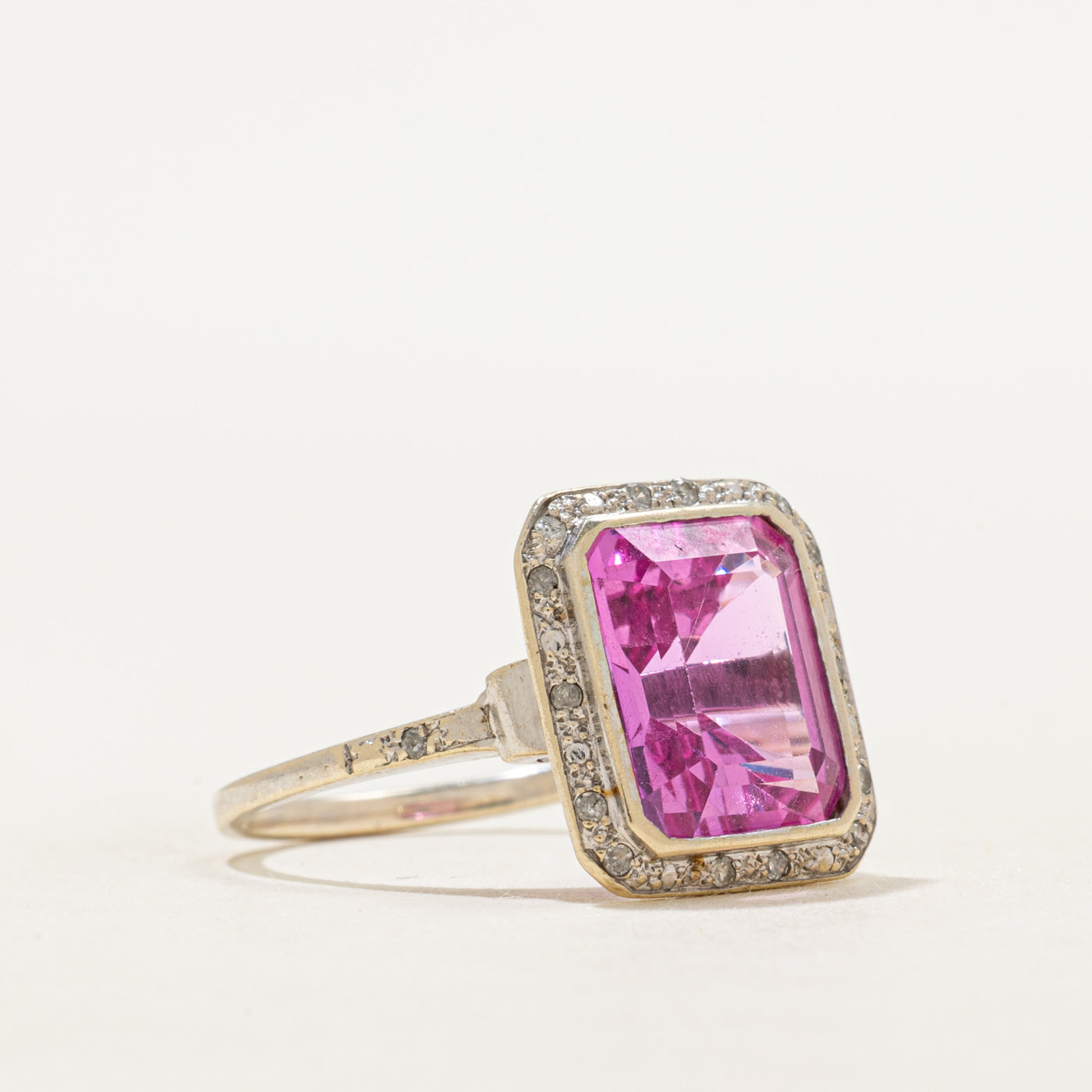 Bezel Set Synthetic Pink Sapphire & Diamond Halo Ring | 6.70ct, 0.02ctw | SZ 6.75