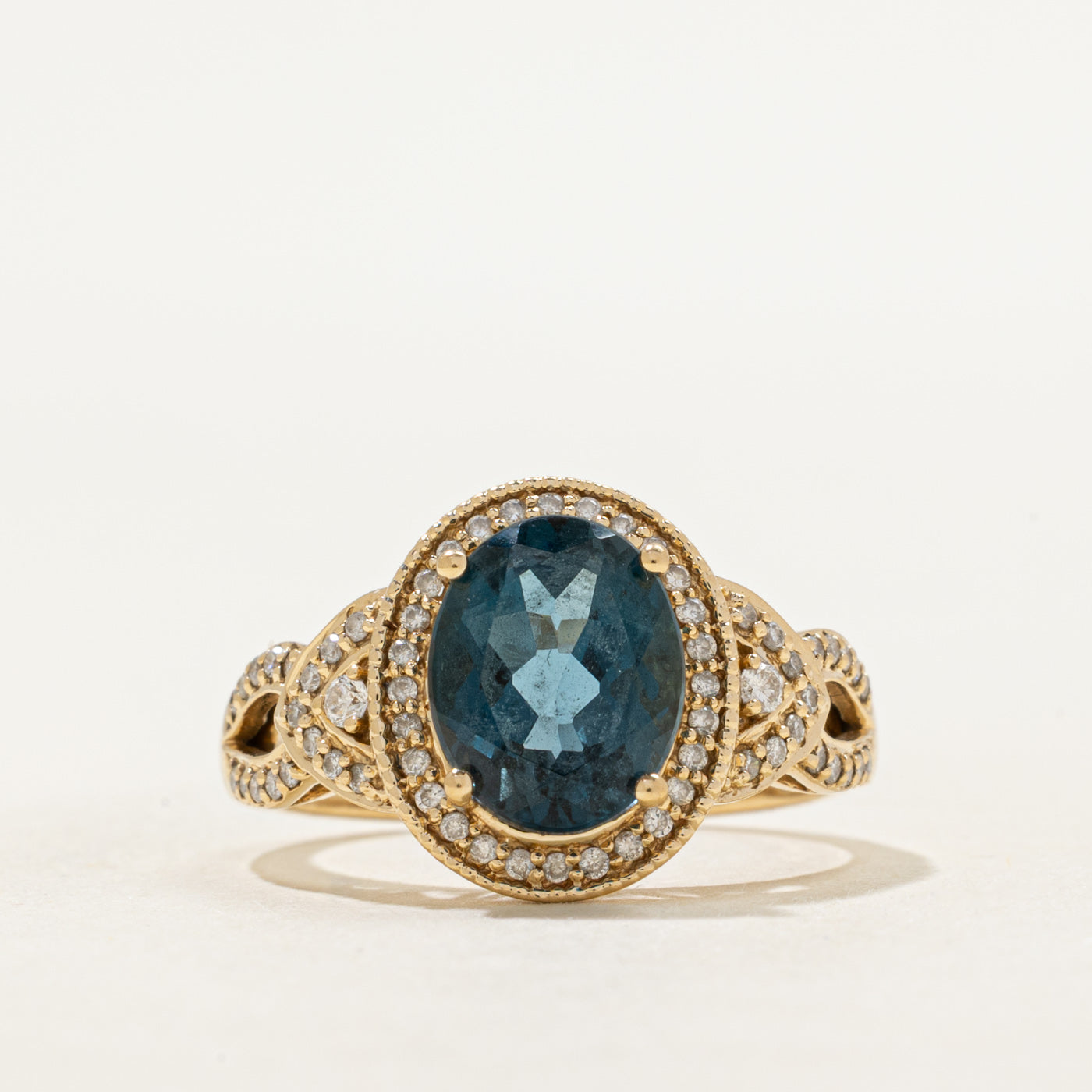 Oval Cut Blue Topaz & Diamond Halo Ring | 2.70ct, 0.16ctw | SZ 8