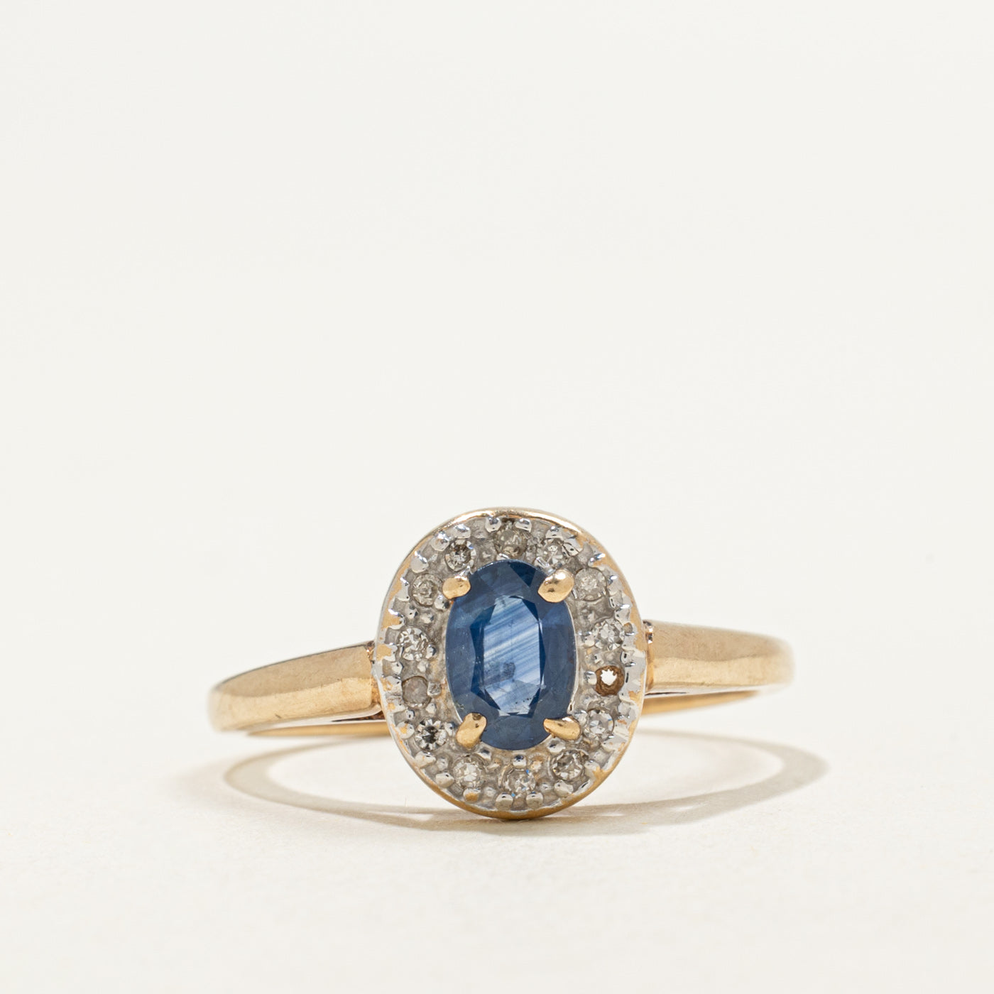 10K Oval Cut Sapphire & Diamond Halo Ring | 0.50ct, 0.07ctw | SZ 7.0