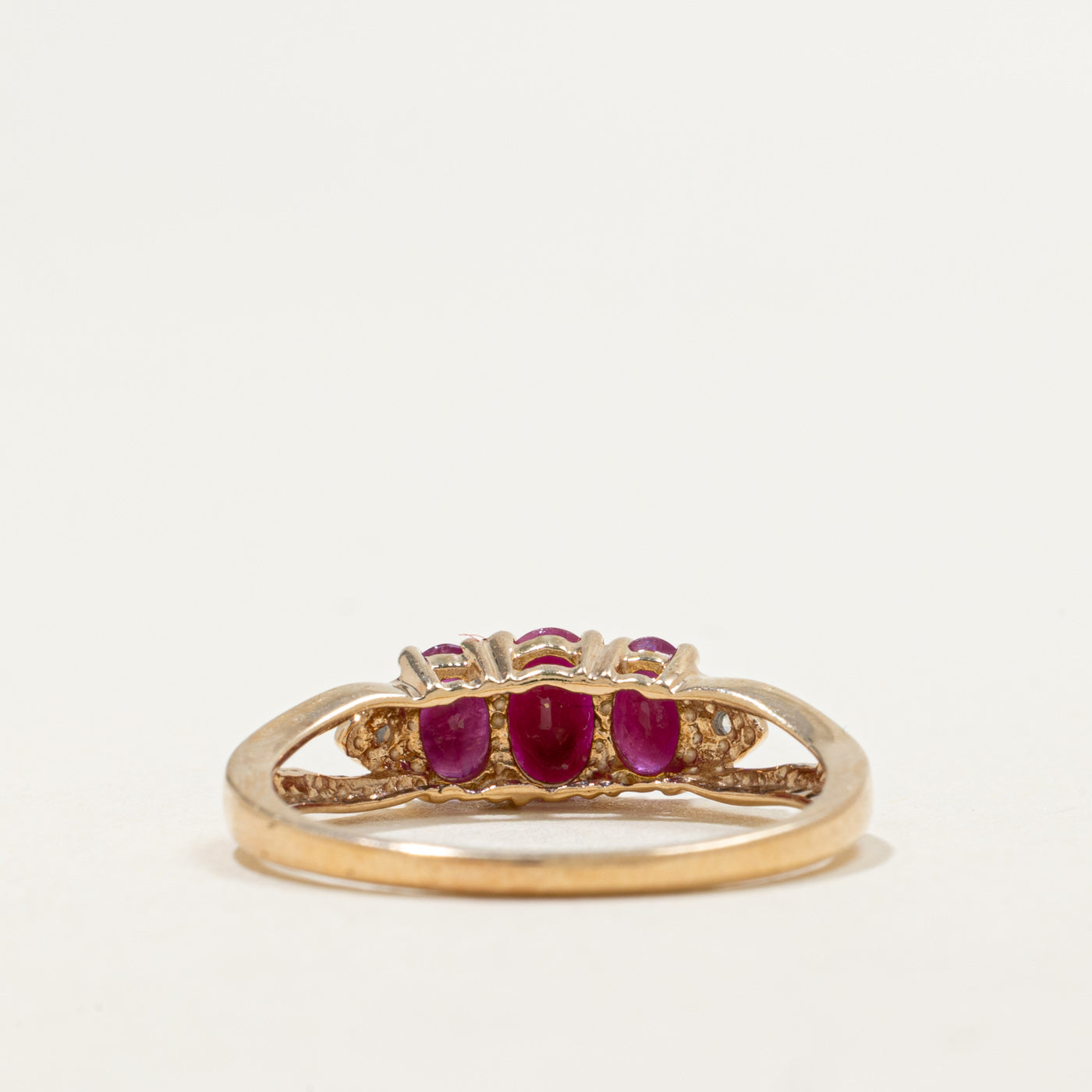 10K Three Stone Oval Cut Ruby & Diamond Ring | 1.00ctw, 0.01ctw | SZ 8.0