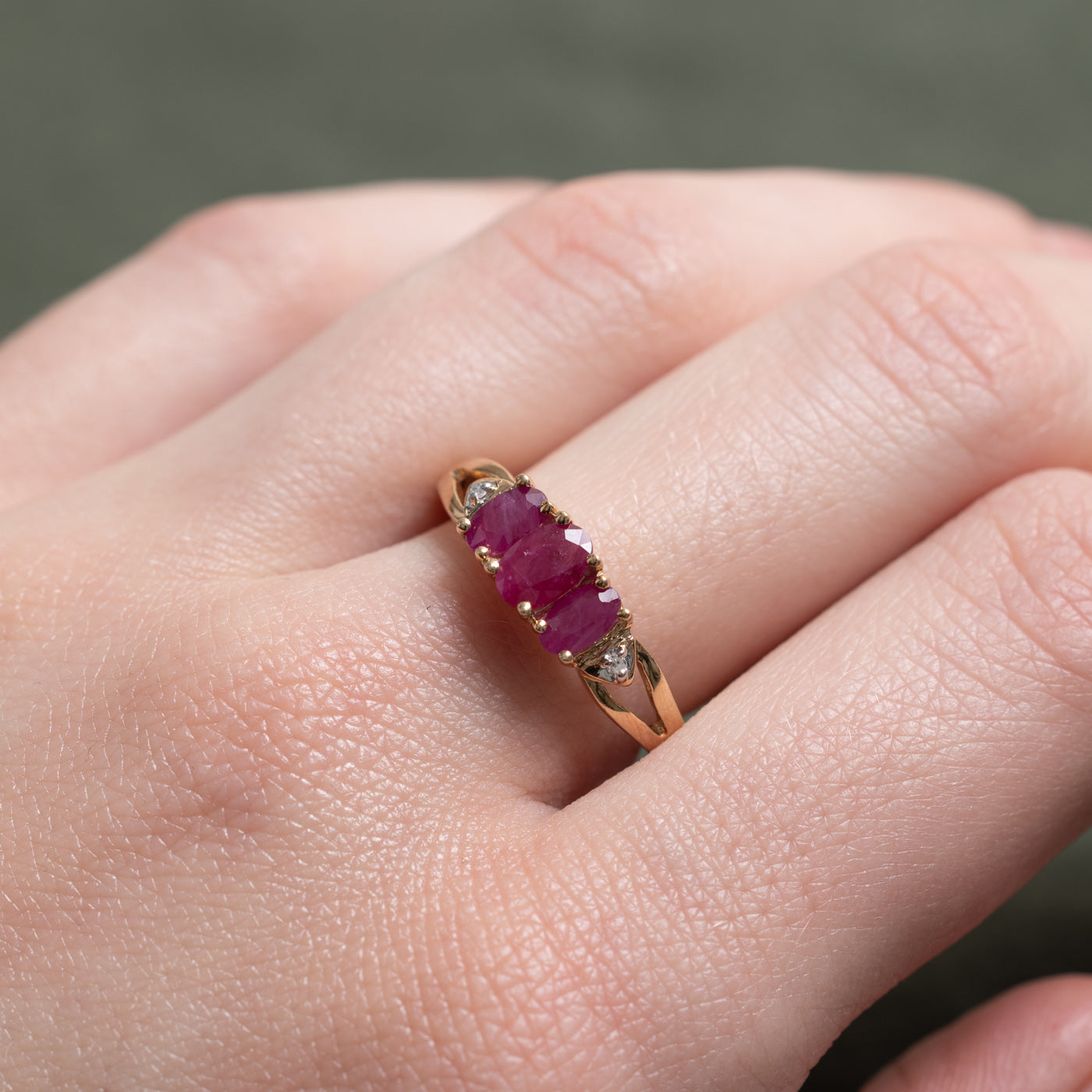 10K Three Stone Oval Cut Ruby & Diamond Ring | 1.00ctw, 0.01ctw | SZ 8.0