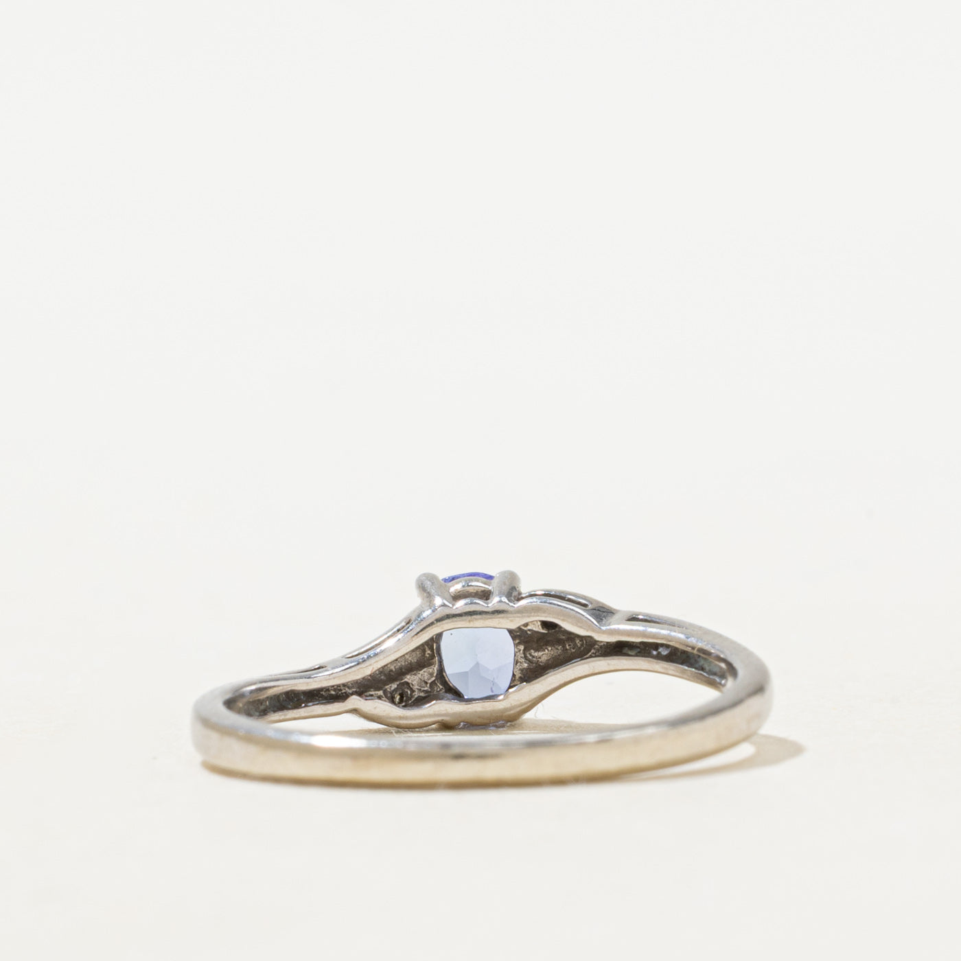 Oval Cut Tanzanite & Diamond Bypass Ring | 0.22ct, 0.01ctw | SZ 6.0 |