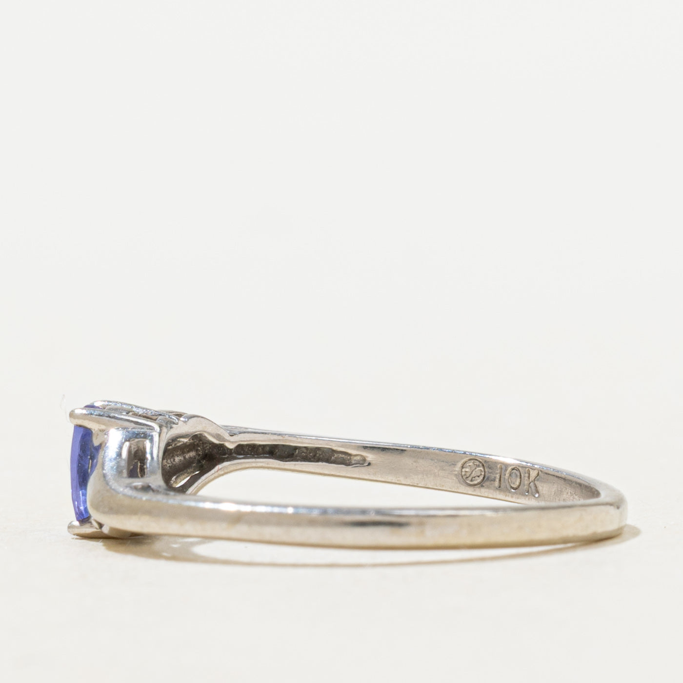 Oval Cut Tanzanite & Diamond Bypass Ring | 0.22ct, 0.01ctw | SZ 6.0 |