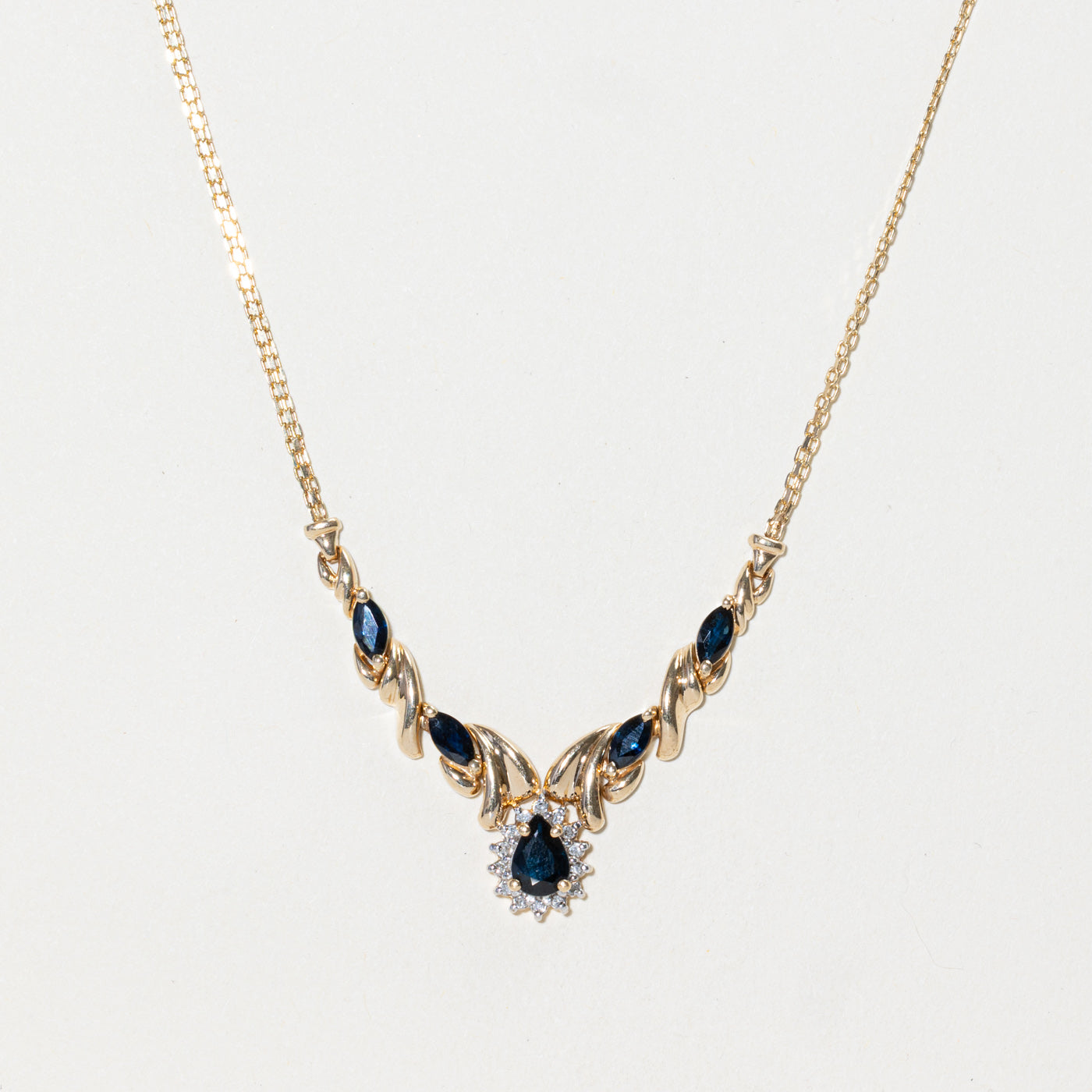 Pear Cut Sapphire & Diamond Halo Pendant Necklace | 1.42ctw, 0.07ctw | 15"