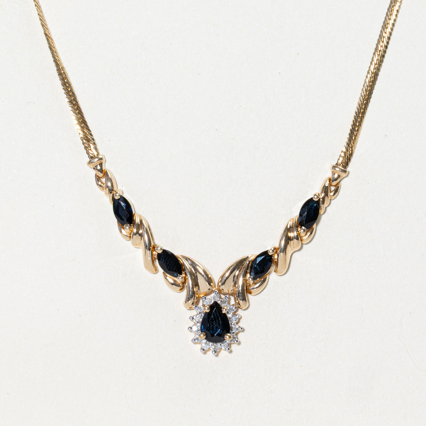 Pear Cut Sapphire & Diamond Halo Pendant Necklace | 2.00ctw, 0.07ctw | 16"