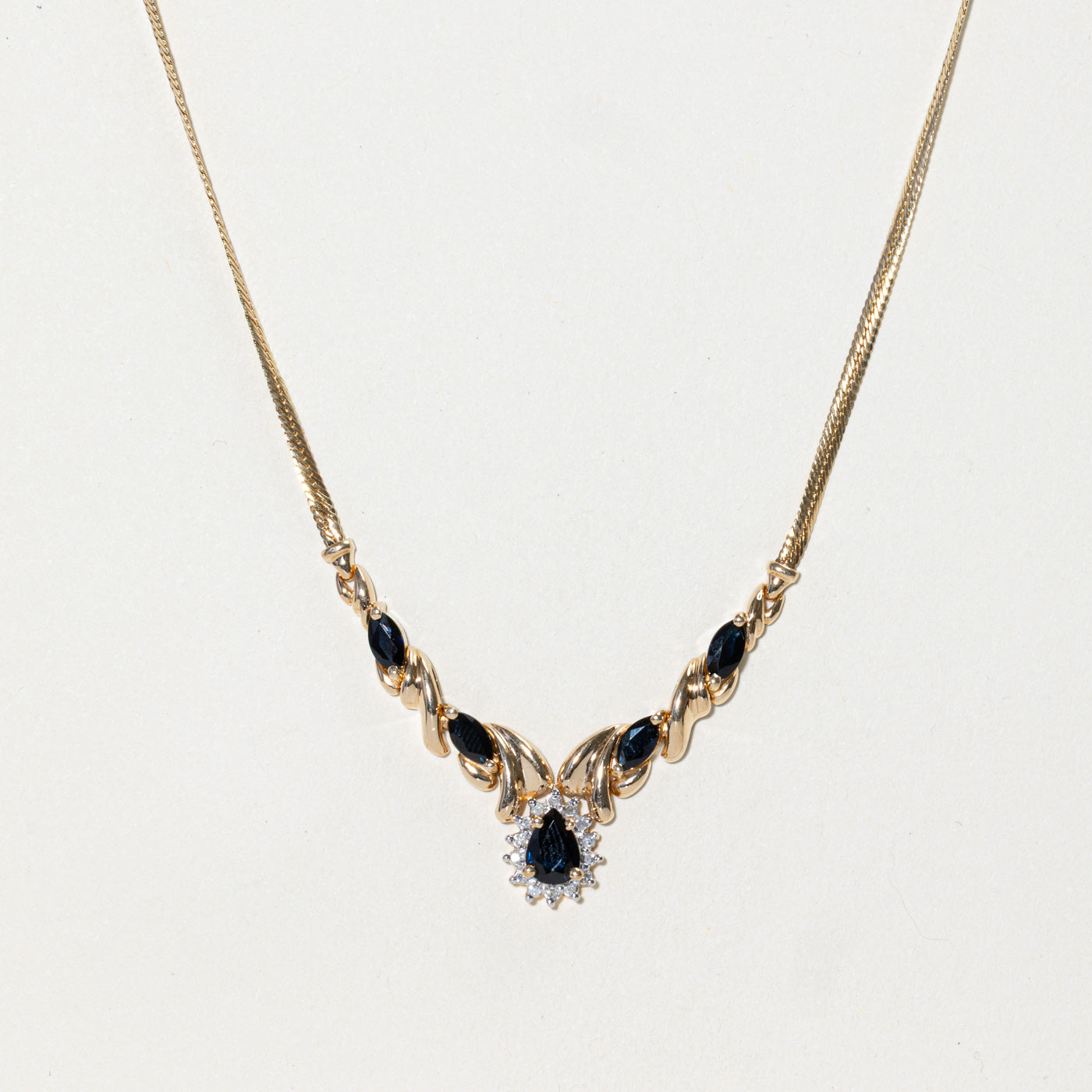 Pear Cut Sapphire & Diamond Halo Pendant Necklace | 2.00ctw, 0.07ctw | 16"