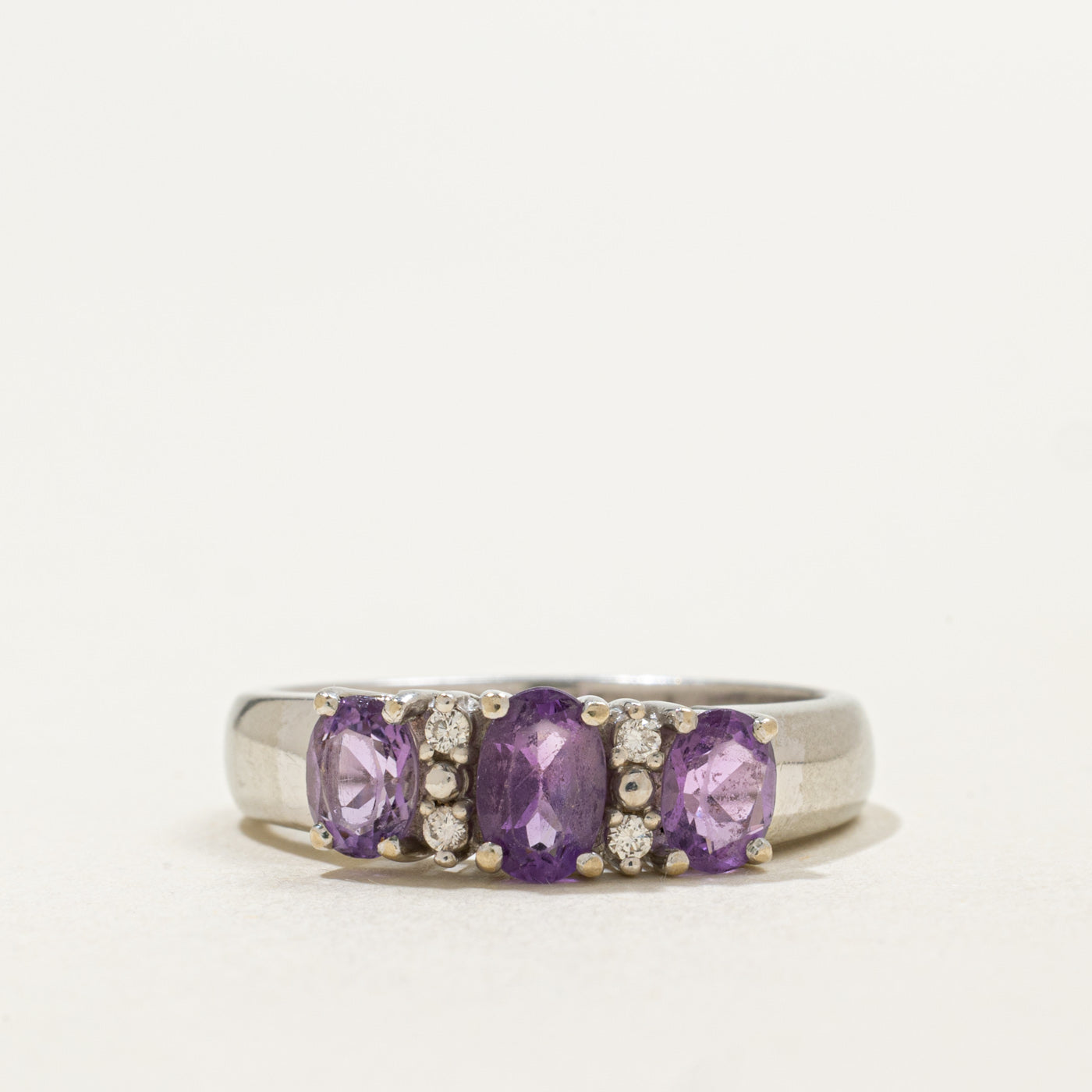 14K Three Stone Oval Cut Amethyst & Diamond Ring | 1.00ctw, 0.04ctw | SZ 7.0