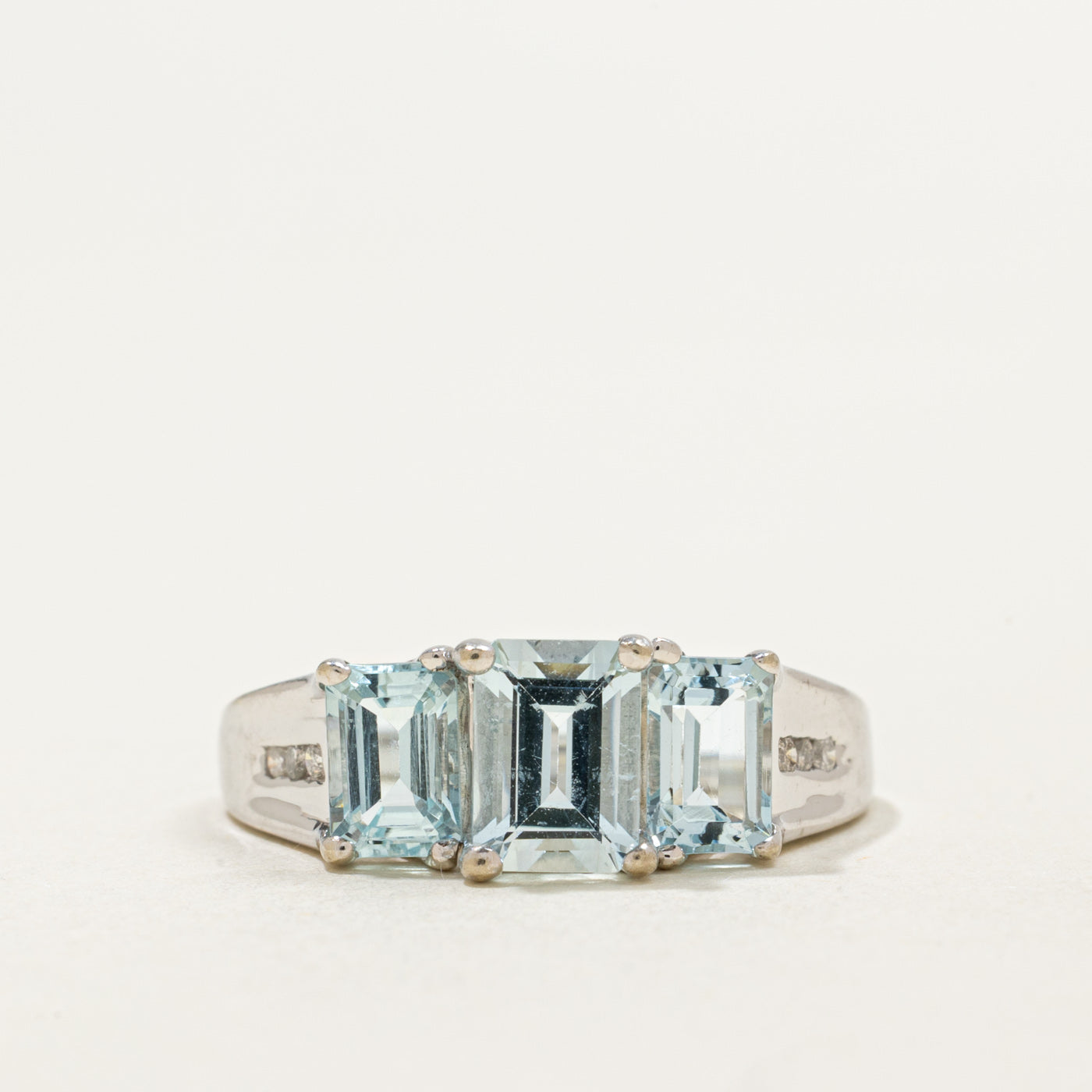 10K Three Stone Emerald Cut Aquamarine & Diamond Ring | 2.20ctw, 0.06ctw | SZ 6.75